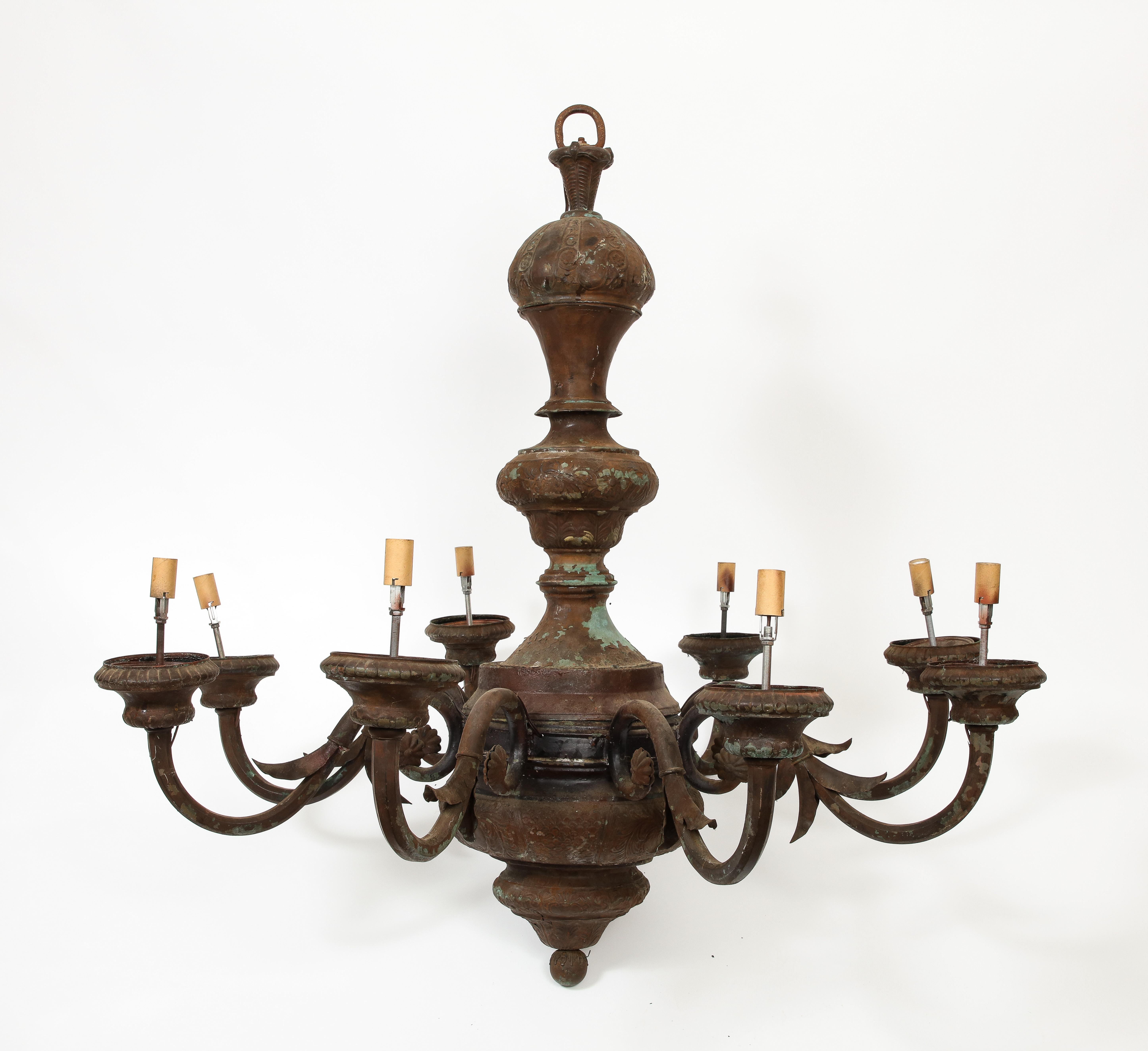 Antique 19th century English Verdigris Metal Light Fixture, 8 socket. Standard base, metal ring at top; the fixture is lighter than it looks as it is hollow. Shows patina/rust, paint losses. 