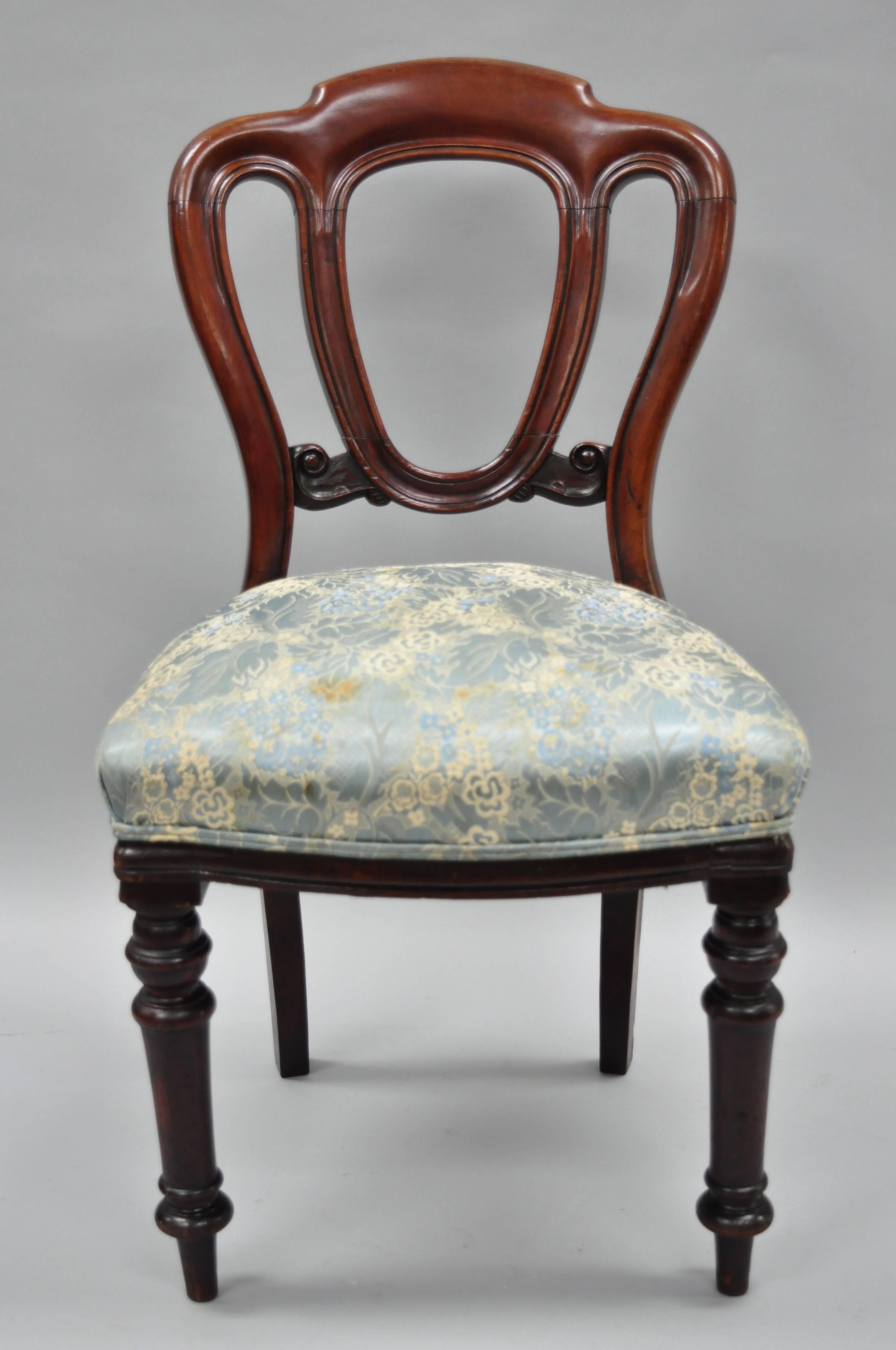 Antique 19th century English Victorian solid mahogany library chair. Item features wonderful authentic warm patina, turn carved legs, heavy solid wood construction, beautiful wood grain, upholstered seat, nicely carved details, circa mid-late 19th