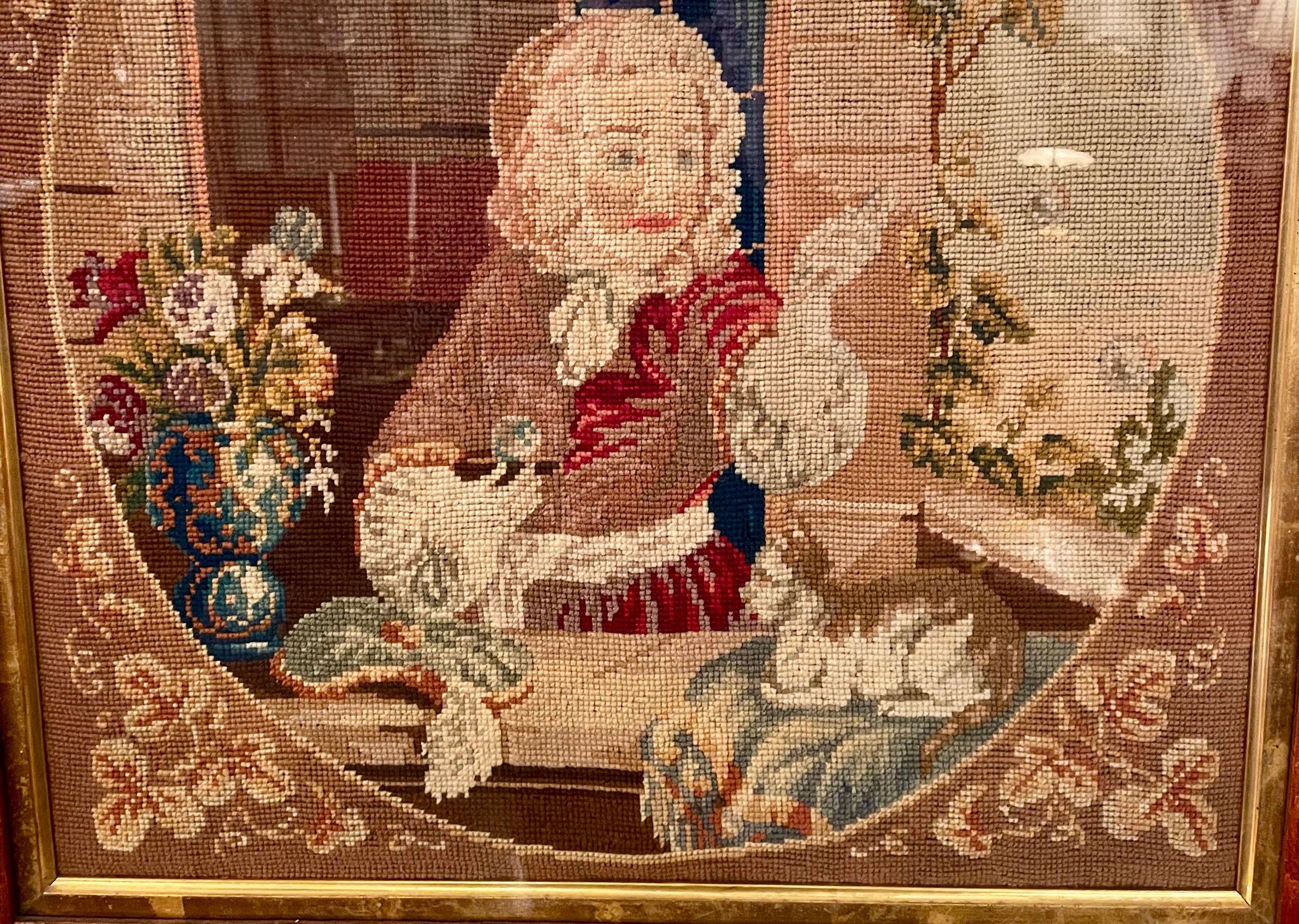 Antique 19th Century English Victorian Framed Needlepoint, Circa 1880.
Depicting a child with cat 
