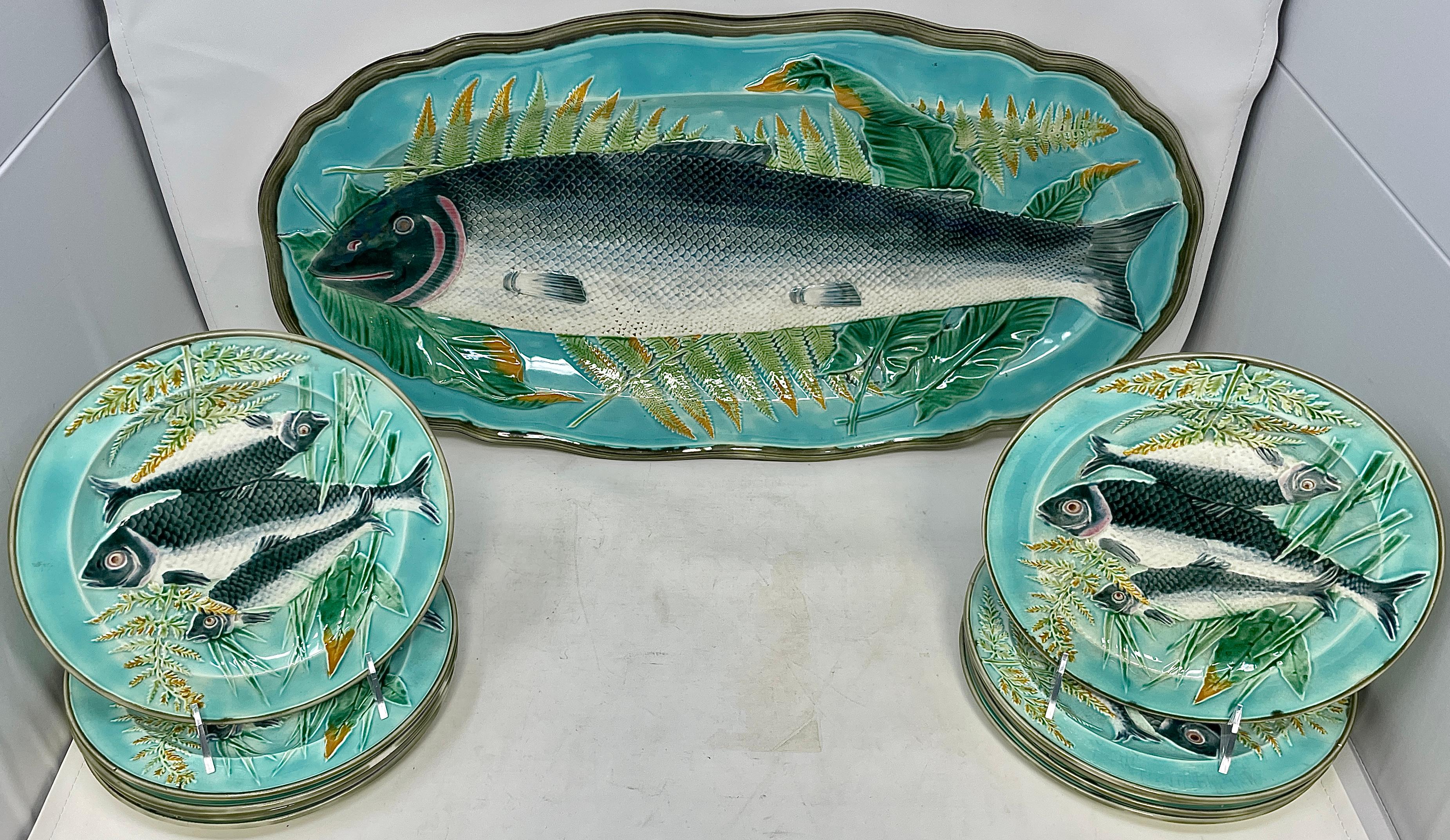 Antique 19th century English wedgwood Majolica fish set, 1 platter and 10 plates, Circa 1880-1890. Aesthetic movement with lovely natural coloring of sea blues, sea-greens and earthy browns.
Platter dimensions: 1.25