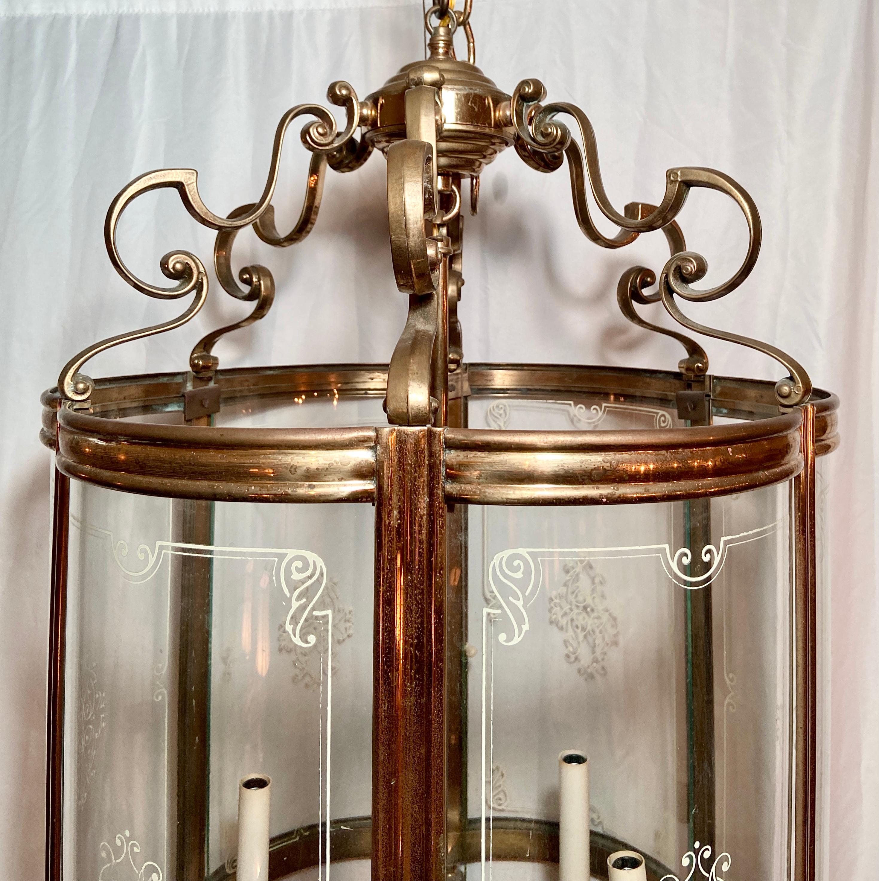 Antique 19th century European solid brass and curved glass lantern.