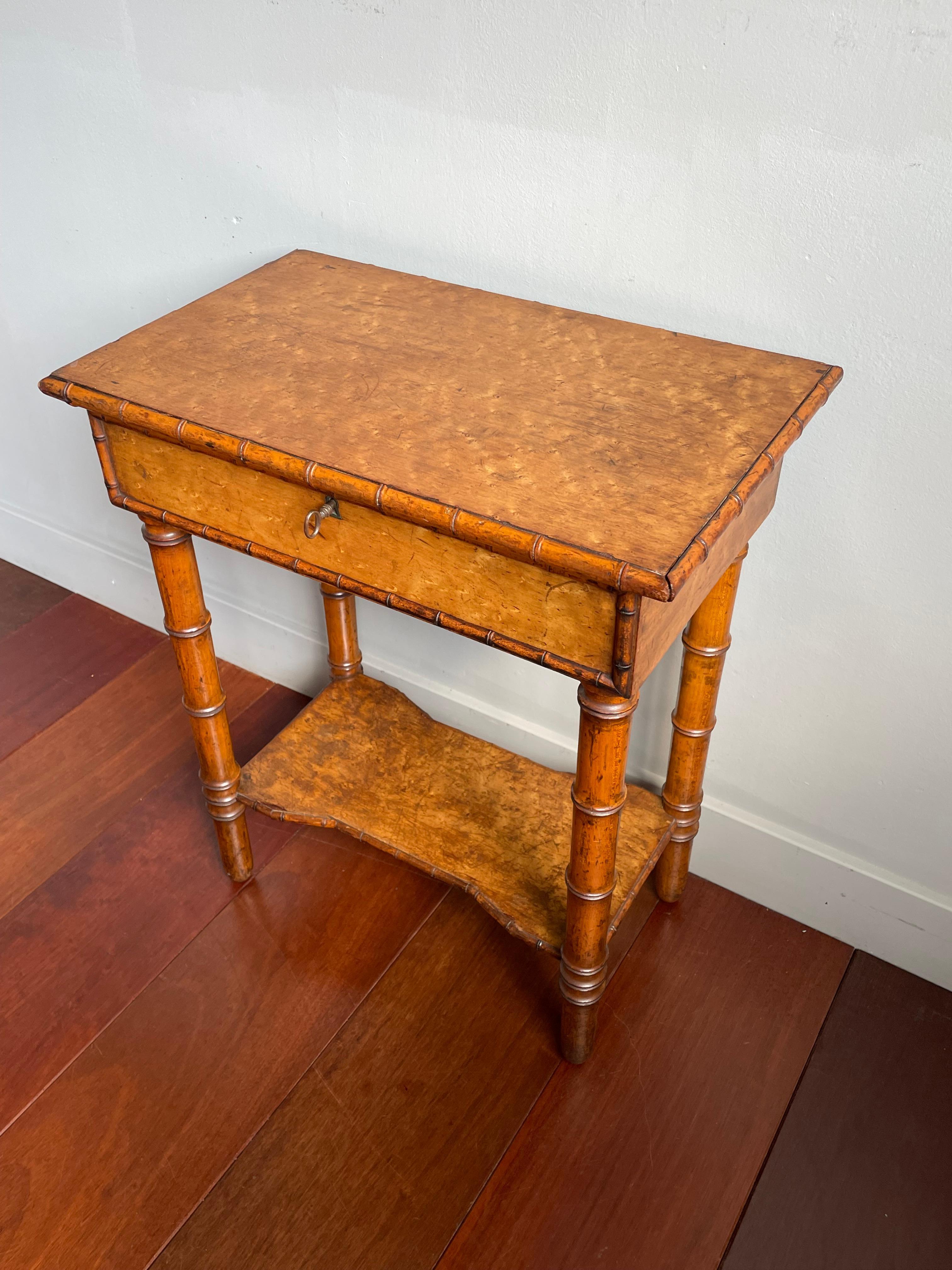 Rare and stylish little side table with a perfect working lock and key.

Faux bamboo furniture has been around since the 19th century and we have sold several pieces both at home and abroad. Most common are the wardrobes and chests of drawers, but