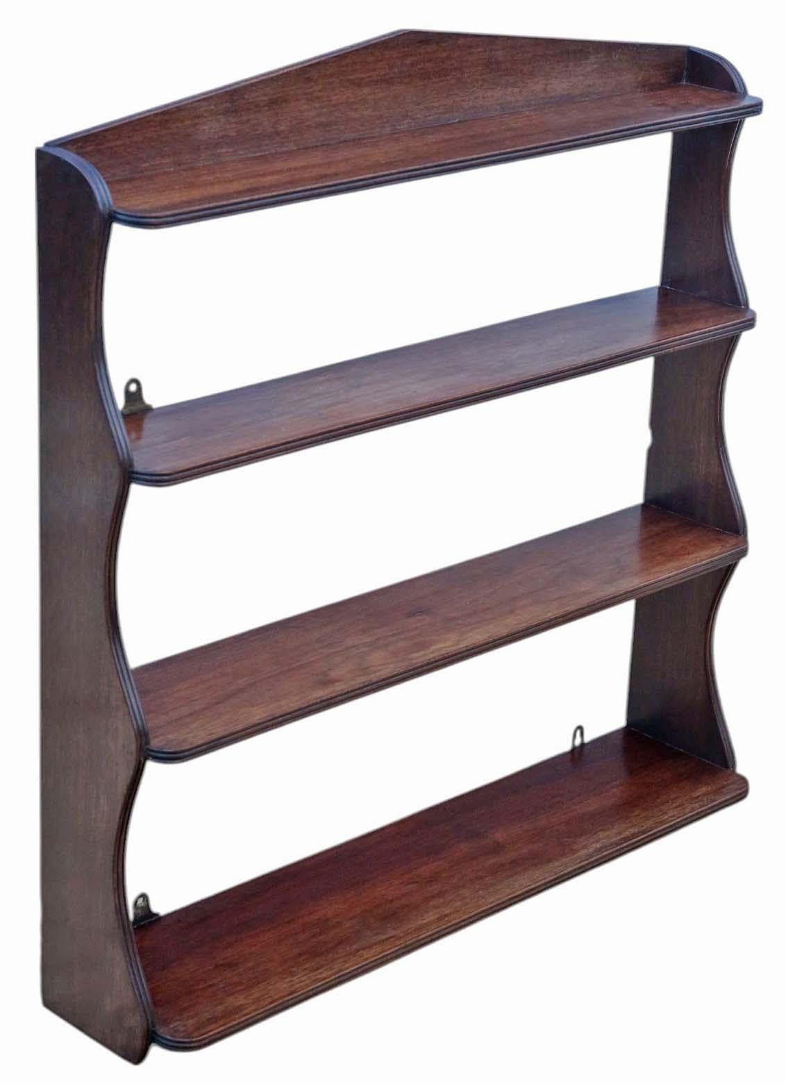 Antica libreria a cascata da parete in mogano del XIX secolo - Qualità pregiata e design elegante
Una libreria a cascata in mogano del XIX secolo di alta qualità che può essere collocata a terra o a parete, caratterizzata da linee pulite e uno stile