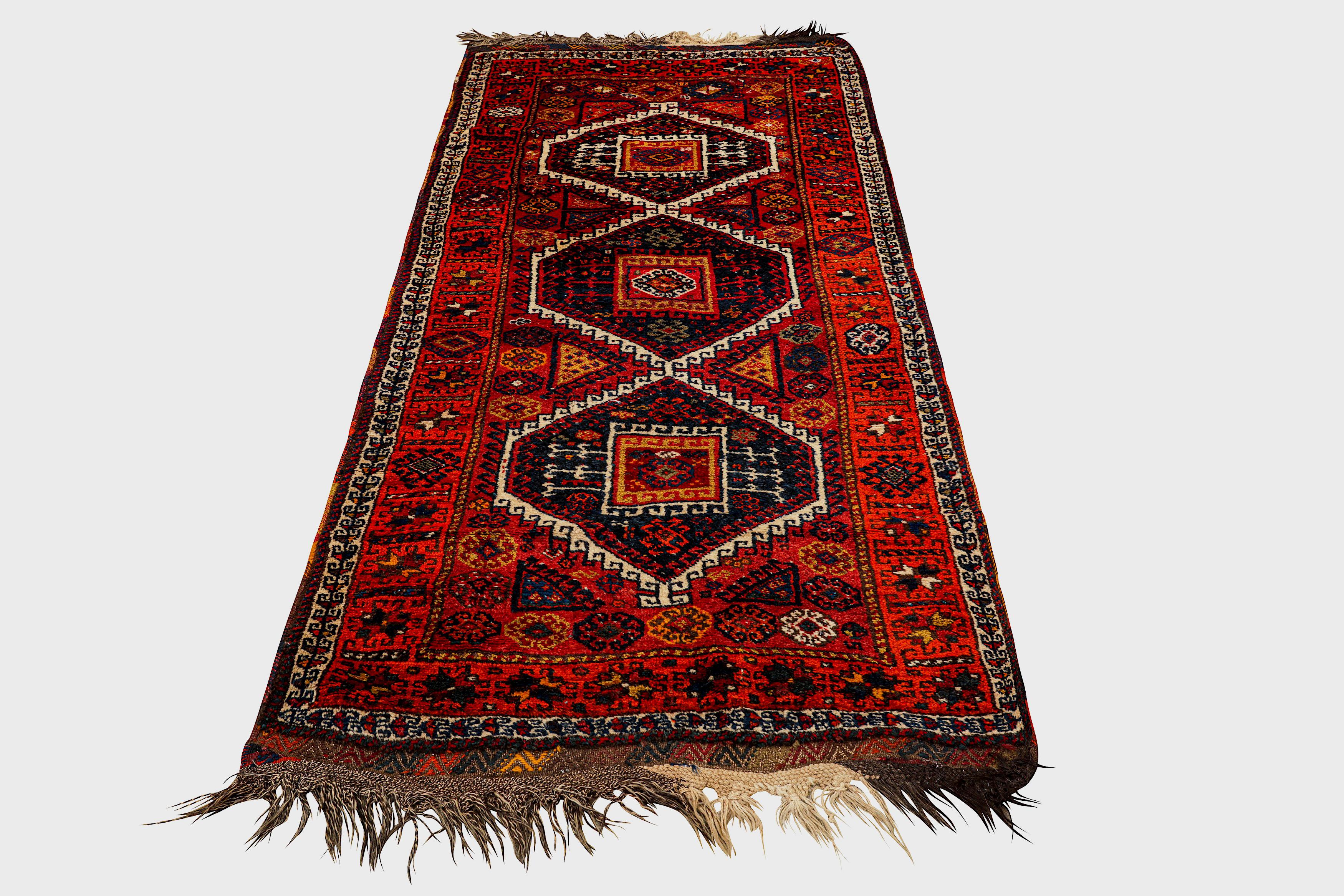 Antique 19th Century Fine Turkish Yuruk Long Runner Rug 7ft 4in x 3ft 6in

224cm. x 107cm. 

Classic for this type with various polychrome hooked panels around three bold multicoloured hooked double medallions. In hooked flowerhead and hooked