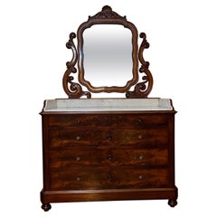 Commode ancienne du 19ème siècle en acajou flamboyant avec dessus en marbre