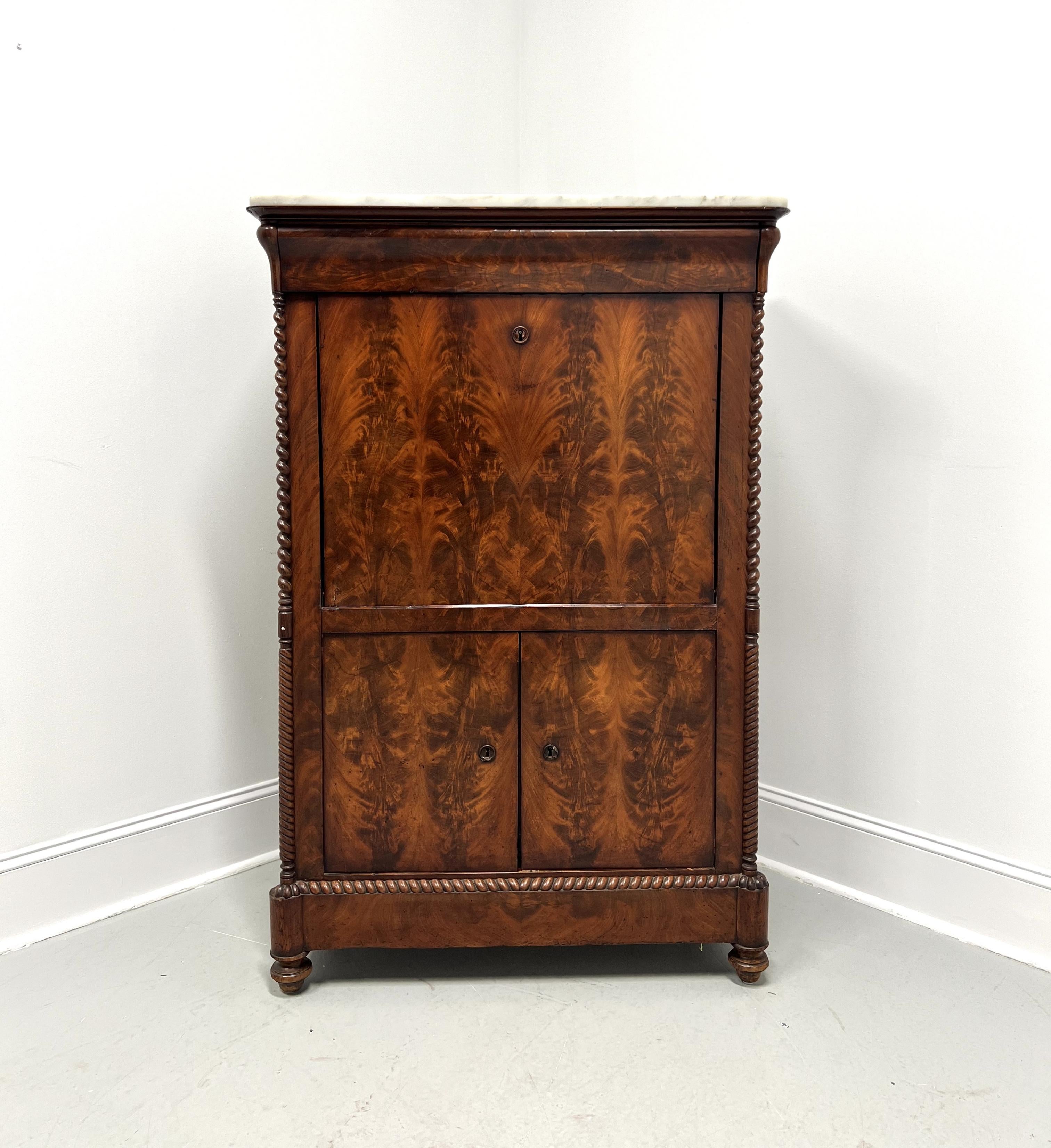An antique Biedermeier style abatante secretary desk, unbranded. Mahogany with flame mahogany veneers, decorative overhang to top, later added white marble top, brass keyhole escutcheons to doors opening, carved rope twist detailing to front sides &