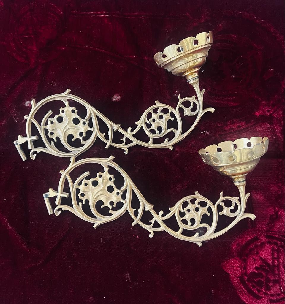 These fantastic unusual four sconces have an incredibly detailed design. Each of them fit large candles with a diameter 7 to 9 cm. The Sconces are sold as they are, no wall mountings are included. They came out of a french Abbey in the city of