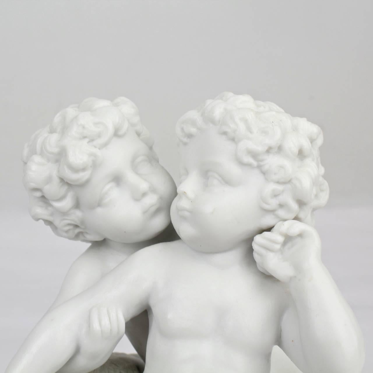 Unglazed Antique 19th Century French Bisque Figurine of Two Putti in an Amorous Embrace For Sale