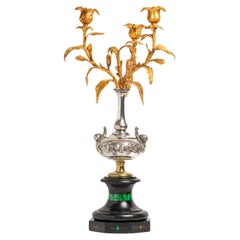 A 19th century French Bronze and Malachite Candelabra 