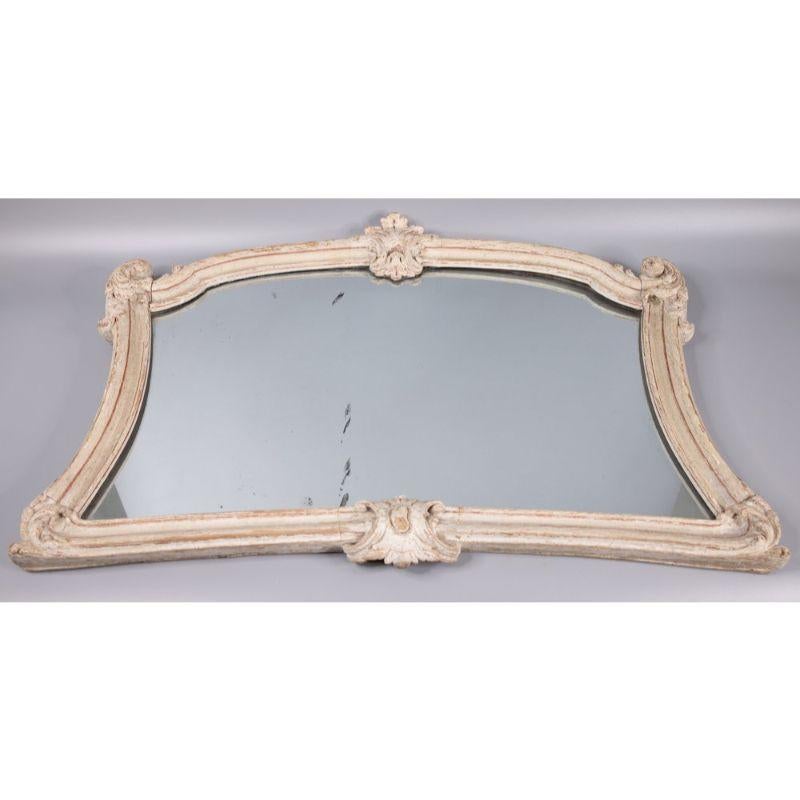 A lovely 19th Century French painted carved wood mirror with the beautiful original paint and patina. Retains the original old mirror glass and wood backing. It would be a gorgeous addition to any room!

 