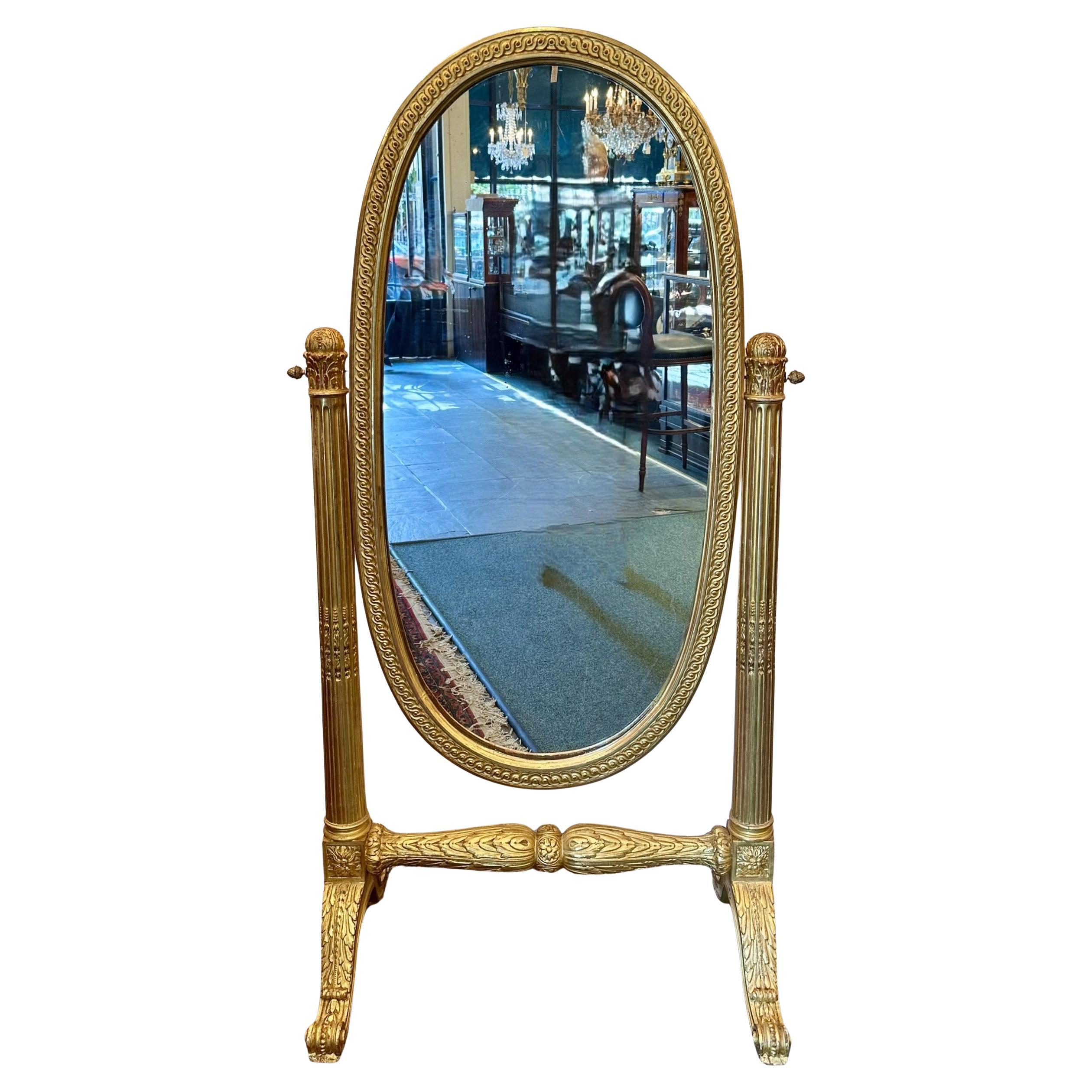 Antique French del XIX secolo in legno intagliato con specchio chevale in foglia d'oro. 