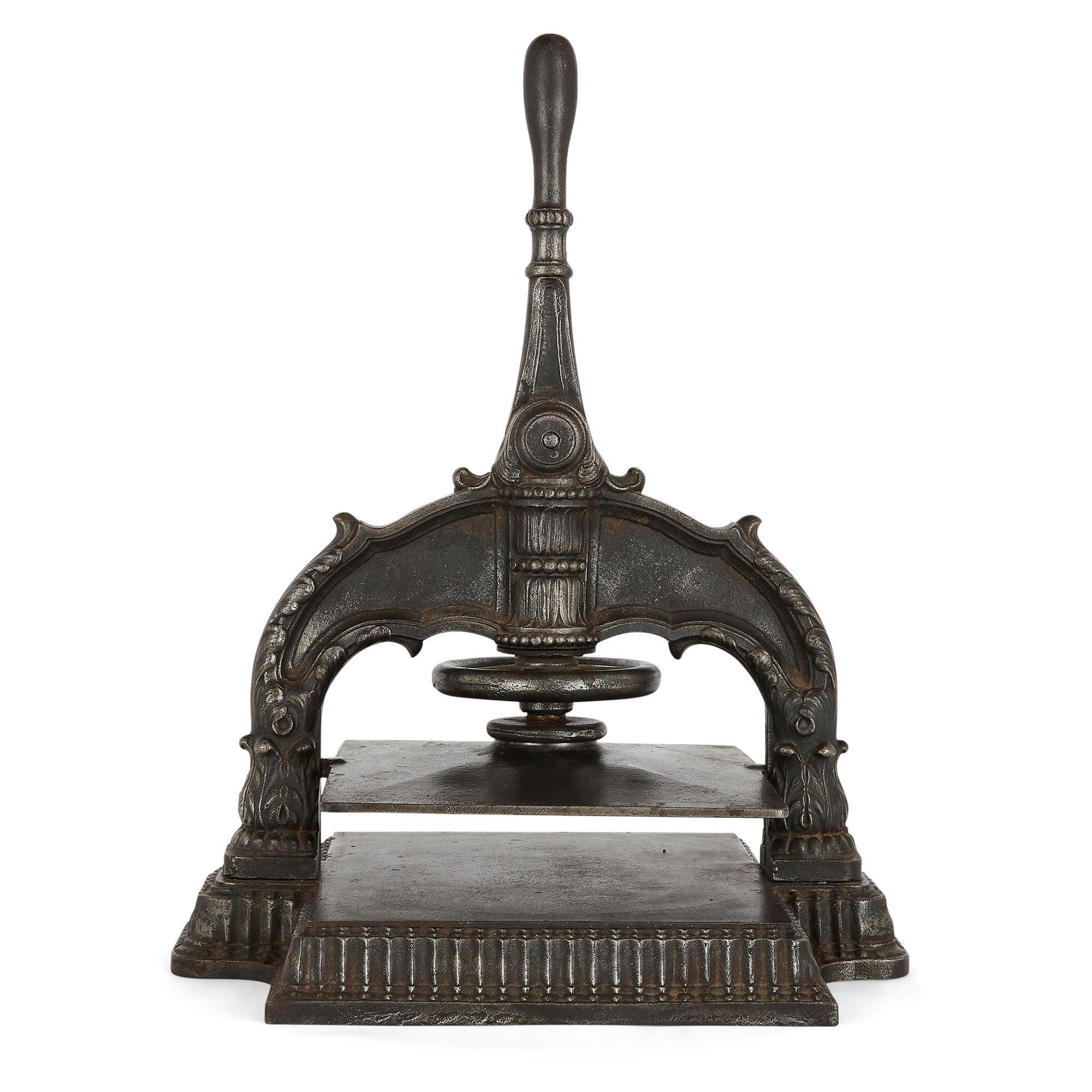 Antique 19th century French cast iron book press
French, 19th century
Dimensions: Height 48cm, width 37cm, depth 32cm

Crafted from strong cast iron, this beautiful piece is a book press, used in the binding process of making books. Made in 19th