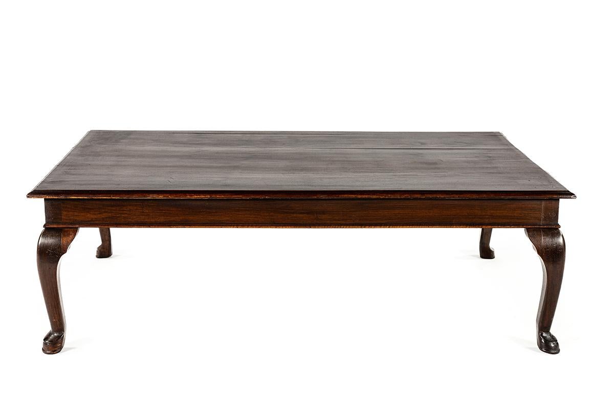 This elegant antique French coffee table was crafted around 1880 and represents a beautiful example of the transitional period between the late Louis Philippe style and the early Belle Époque. The piece combines the refined elegance of 19th-century