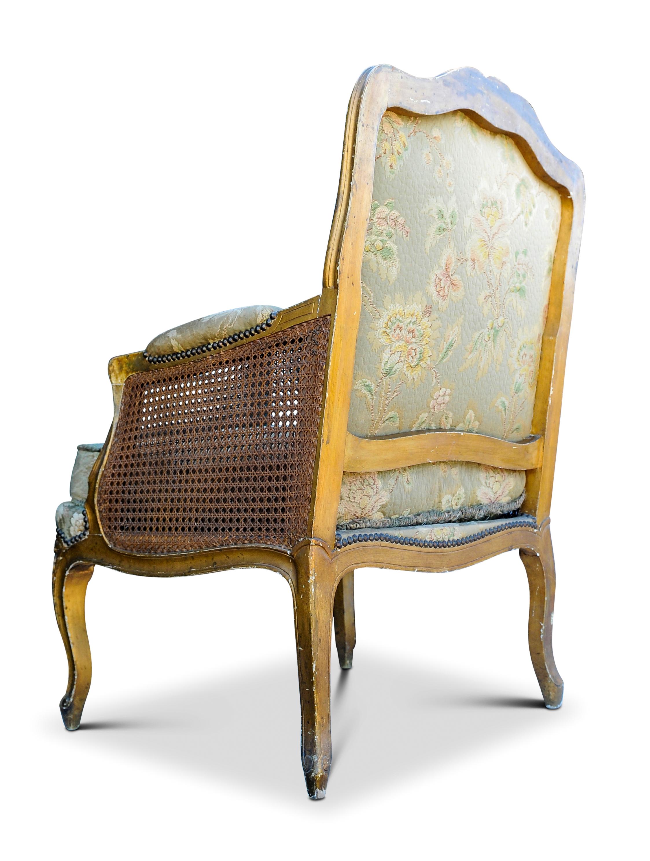 Hand-Crafted Antique 19th Century French Gilded Bergere Armchair with Stud Detailing For Sale