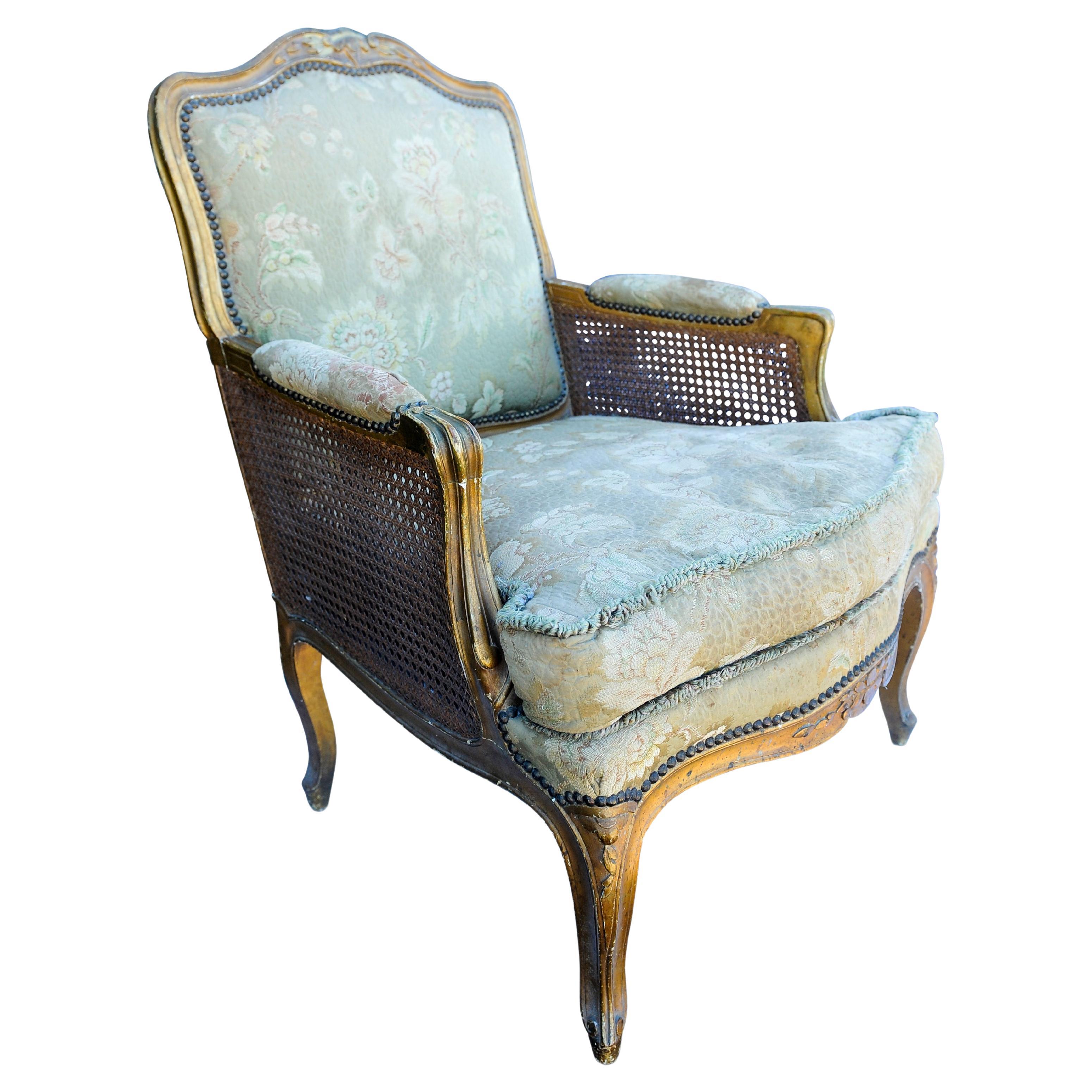 Antique 19th Century French Gilded Bergere Armchair with Stud Detailing For Sale