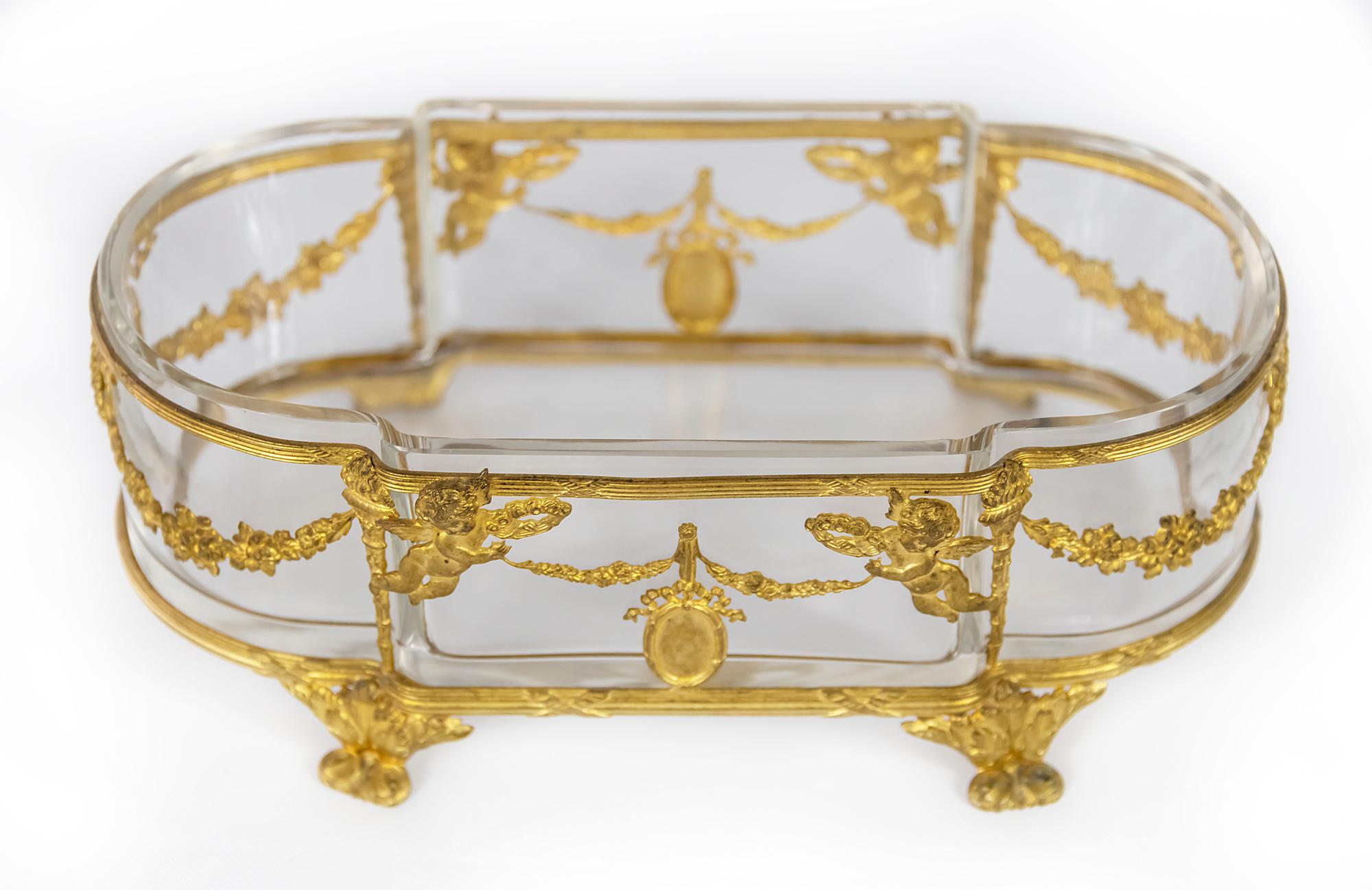 Antique 19th century French gilded bronze and glass dish.
The glass is decorated with gilded bronze decor.