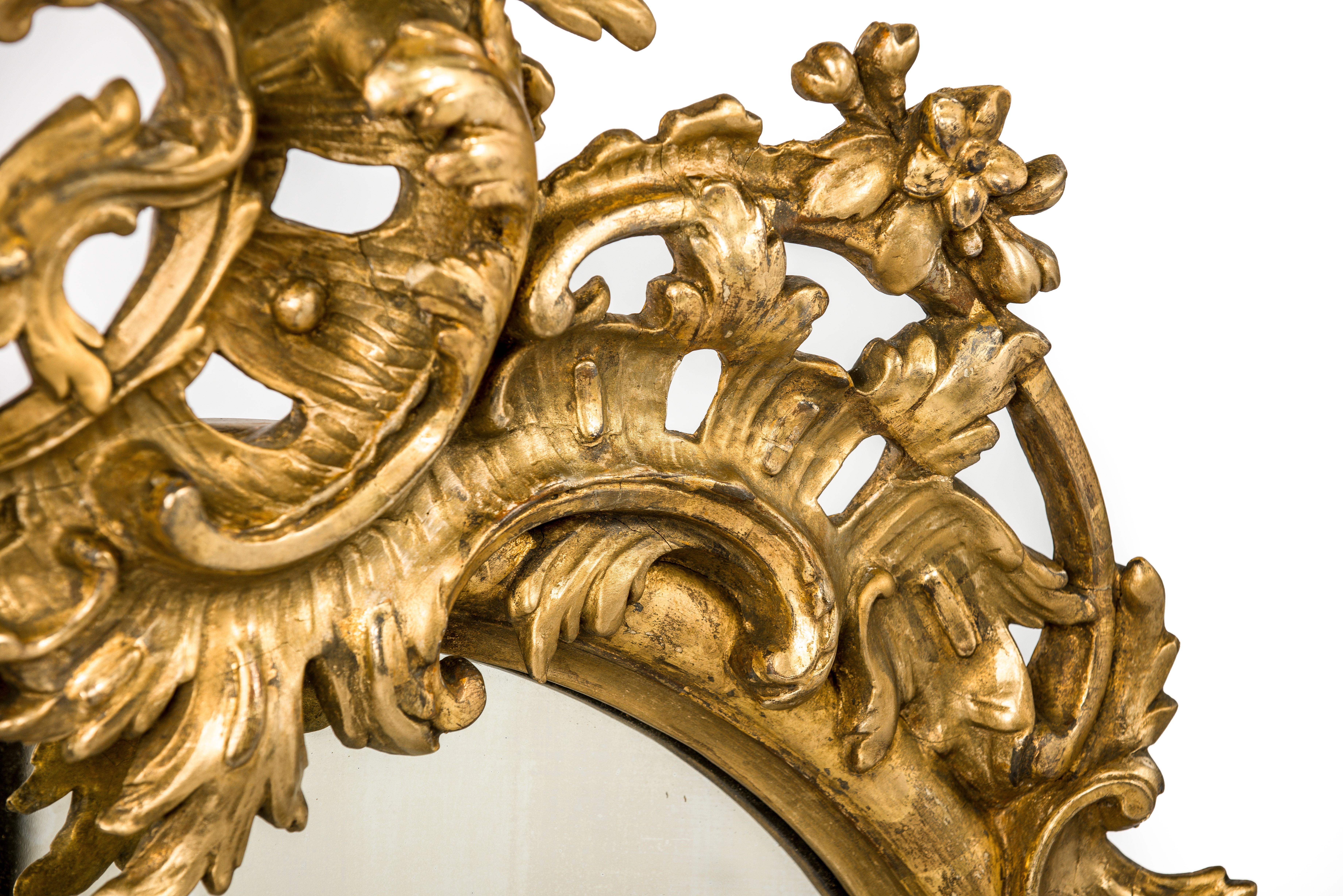 Carved Antique 19th Century French Gold Rococo Wall Mirror with Cherubs or Putti