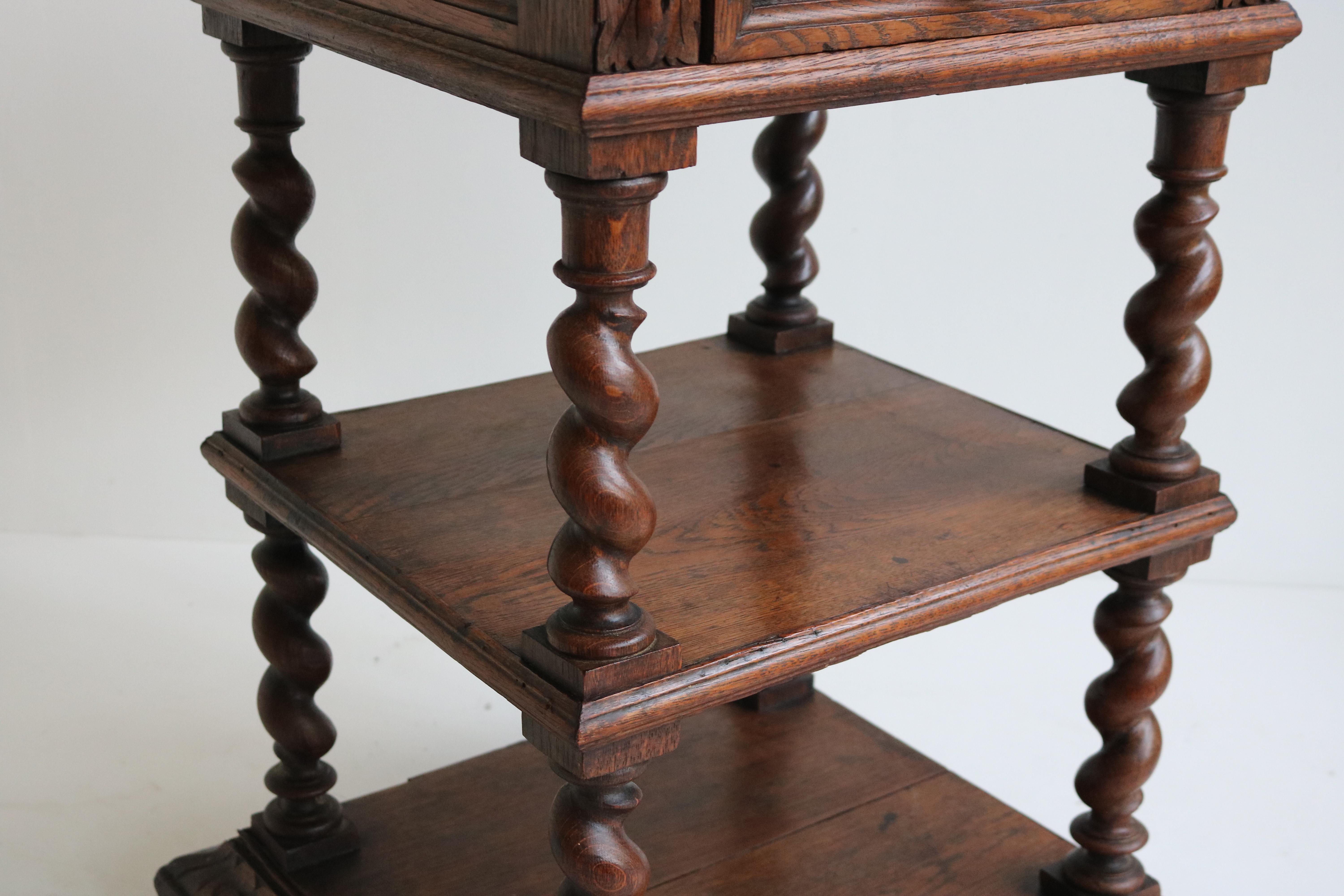 Marvelous 19th century French renaissance Revival Night stand / side table in Hunt / Black Forest style with barley twisted columns.
Finished on all sides so you are able to place this freestanding in your room for use as a nightstand/side table