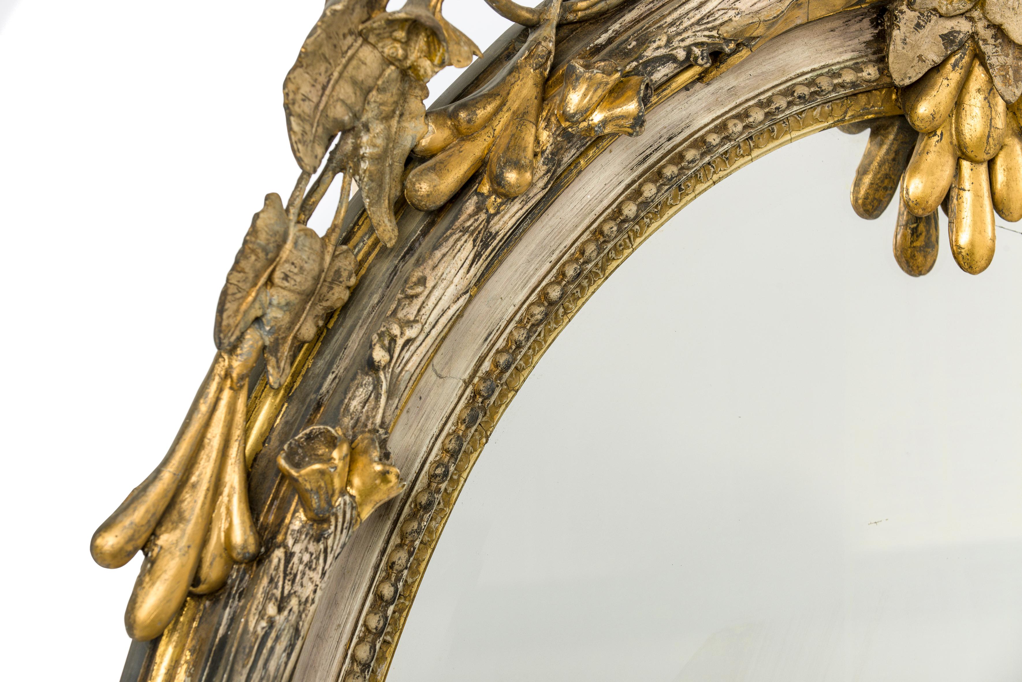 long oval gold mirror