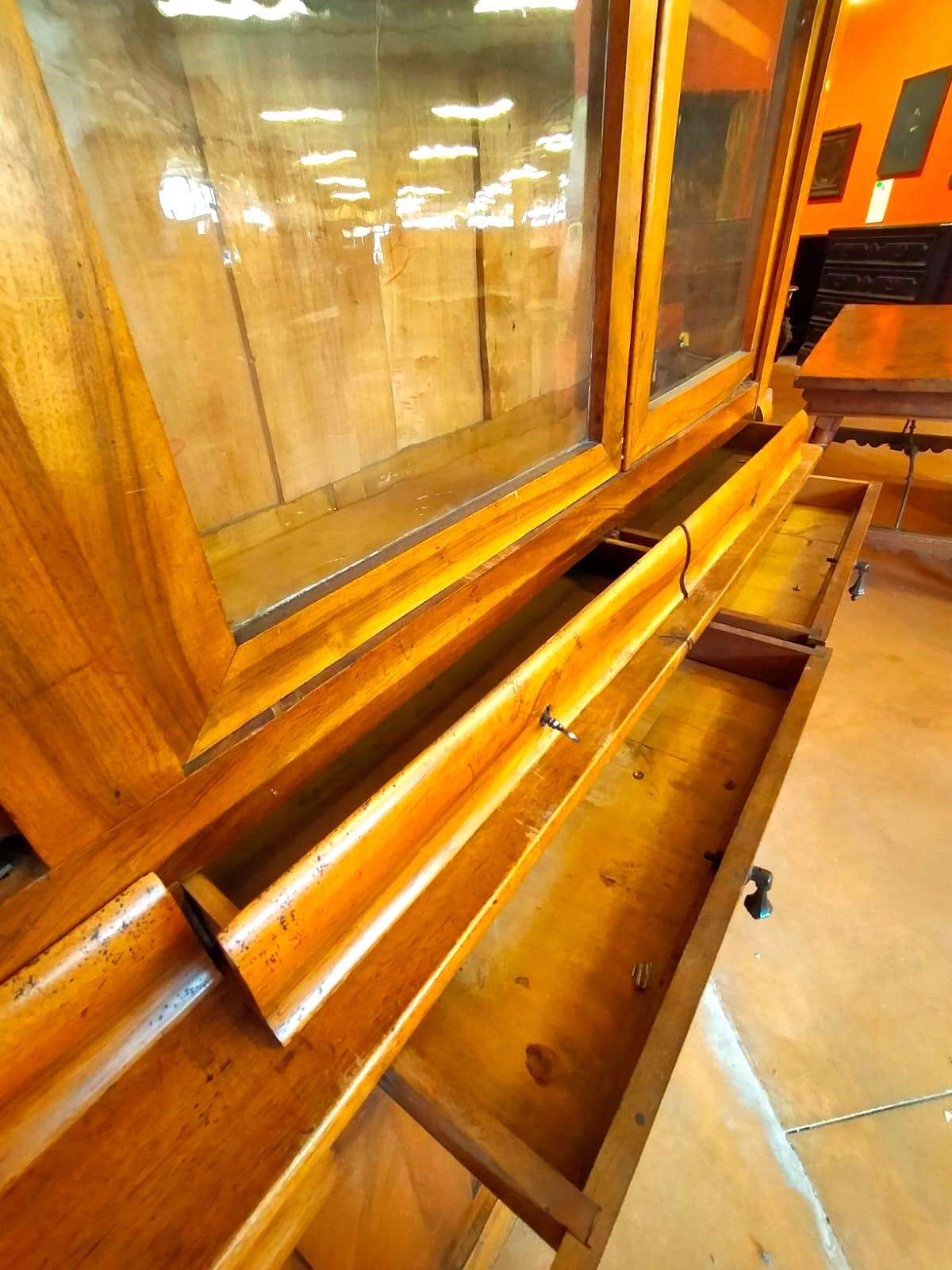 Vetro Antique 19th Century French Light Walnut Bookcase with Glass Doors and Drawers in vendita