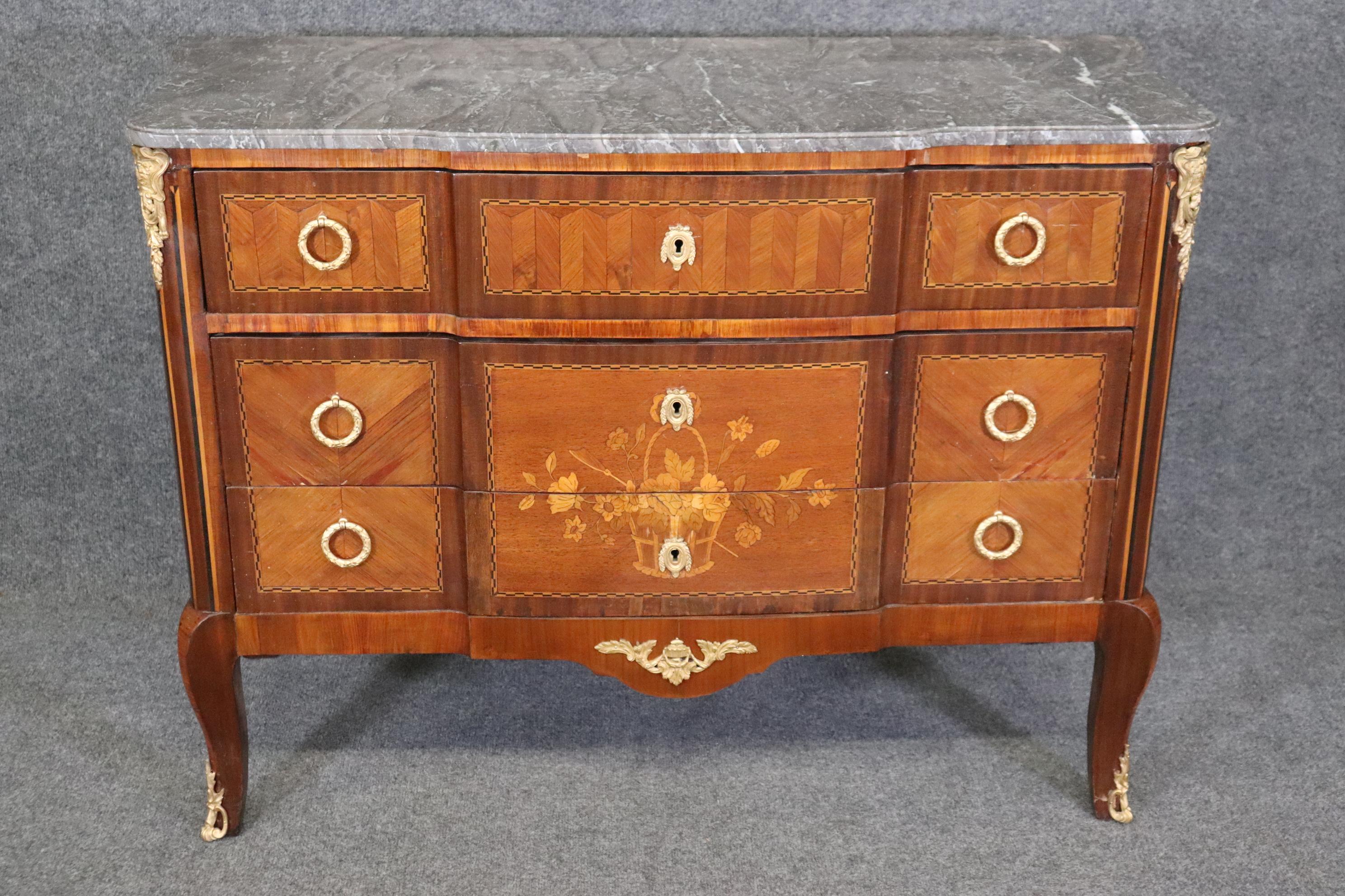 Dimensions: Height: 33 1/2 in Width: 45 3/4 in Depth: 19 1/2 in 

This antique 19th century French Louis XV style marble top commode, chest of drawers is a great example of quality French furniture! If you look at the photos provided, you will see