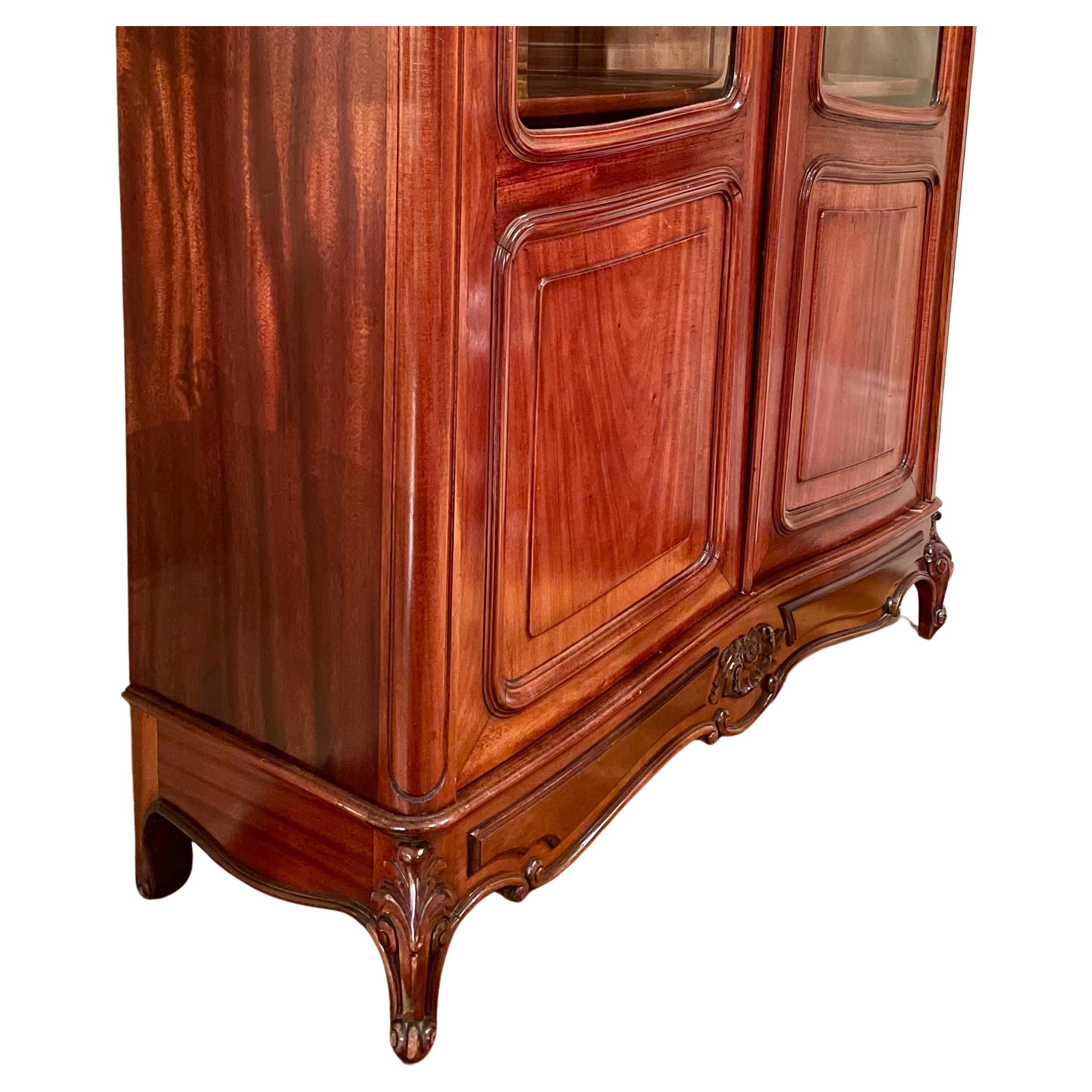Antique 19th century French mahogany beveled glass front 2-door cabinet, circa 1890.