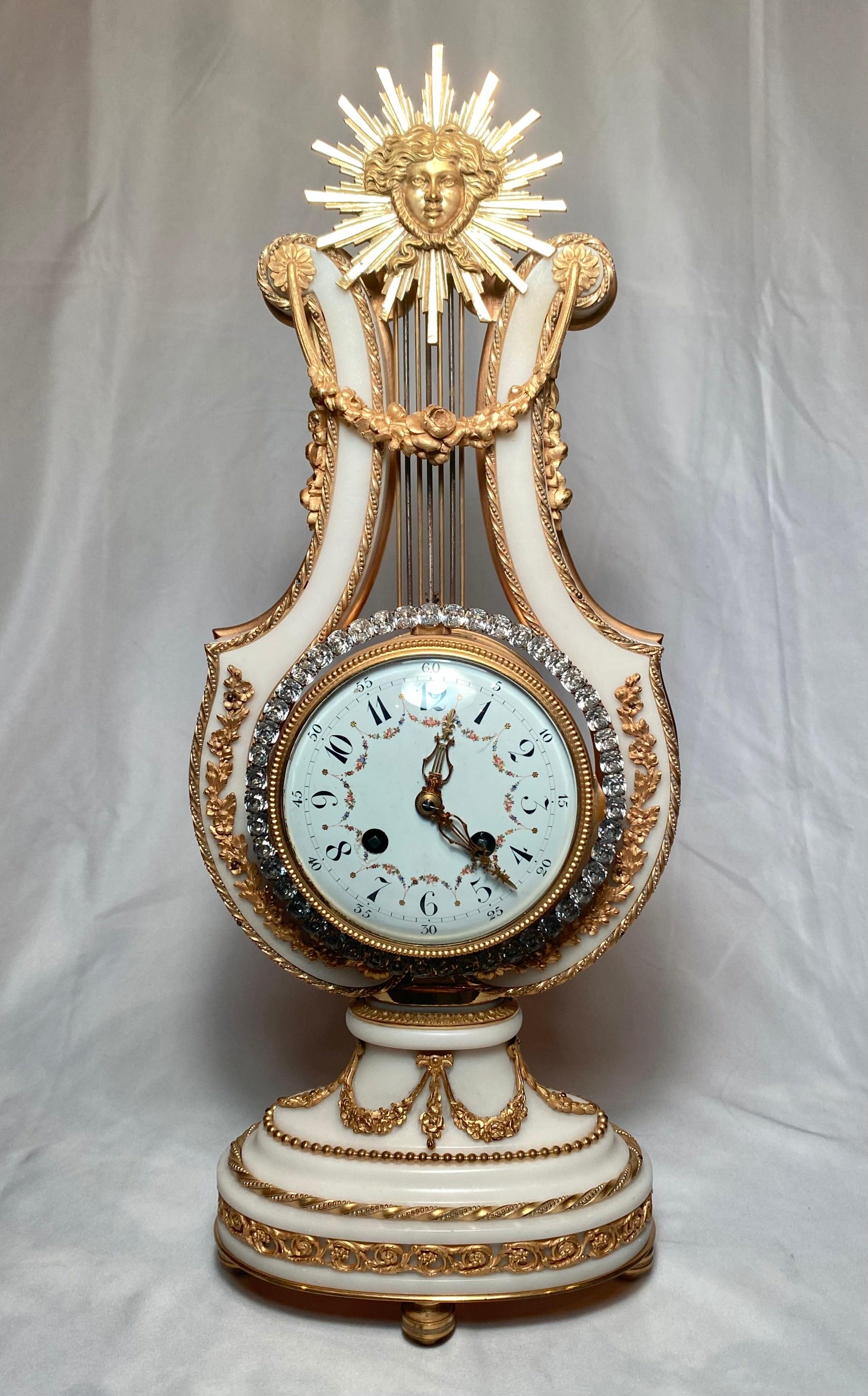 Exquisite antique 19th century French marble and gold bronze 3 piece clock set.