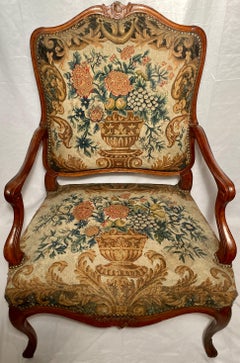 Antique 19th Century French Carved Walnut Needlepoint Armchair.