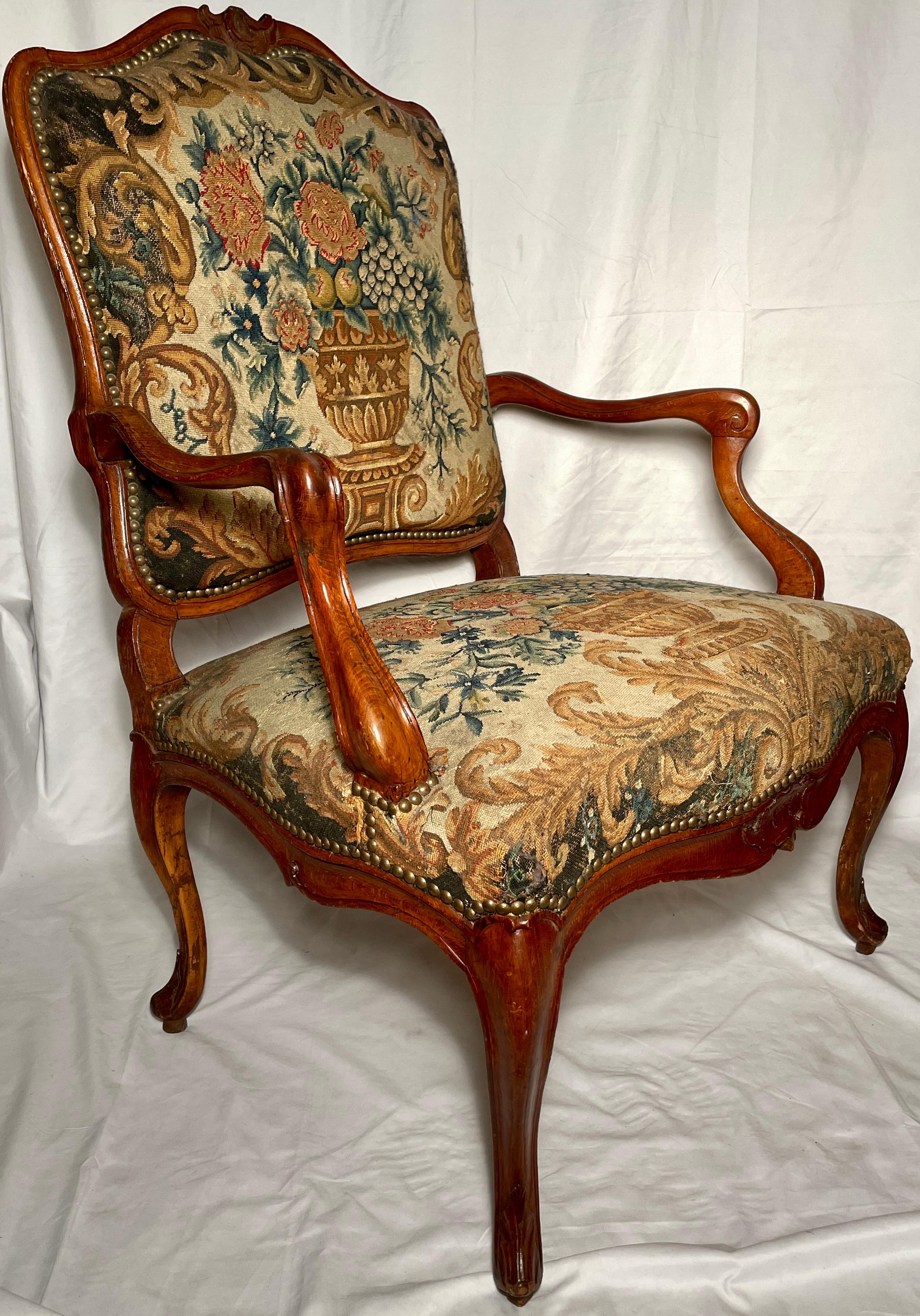 Antique 19th Century French Carved Walnut Needlepoint Armchair. In Good Condition For Sale In New Orleans, LA