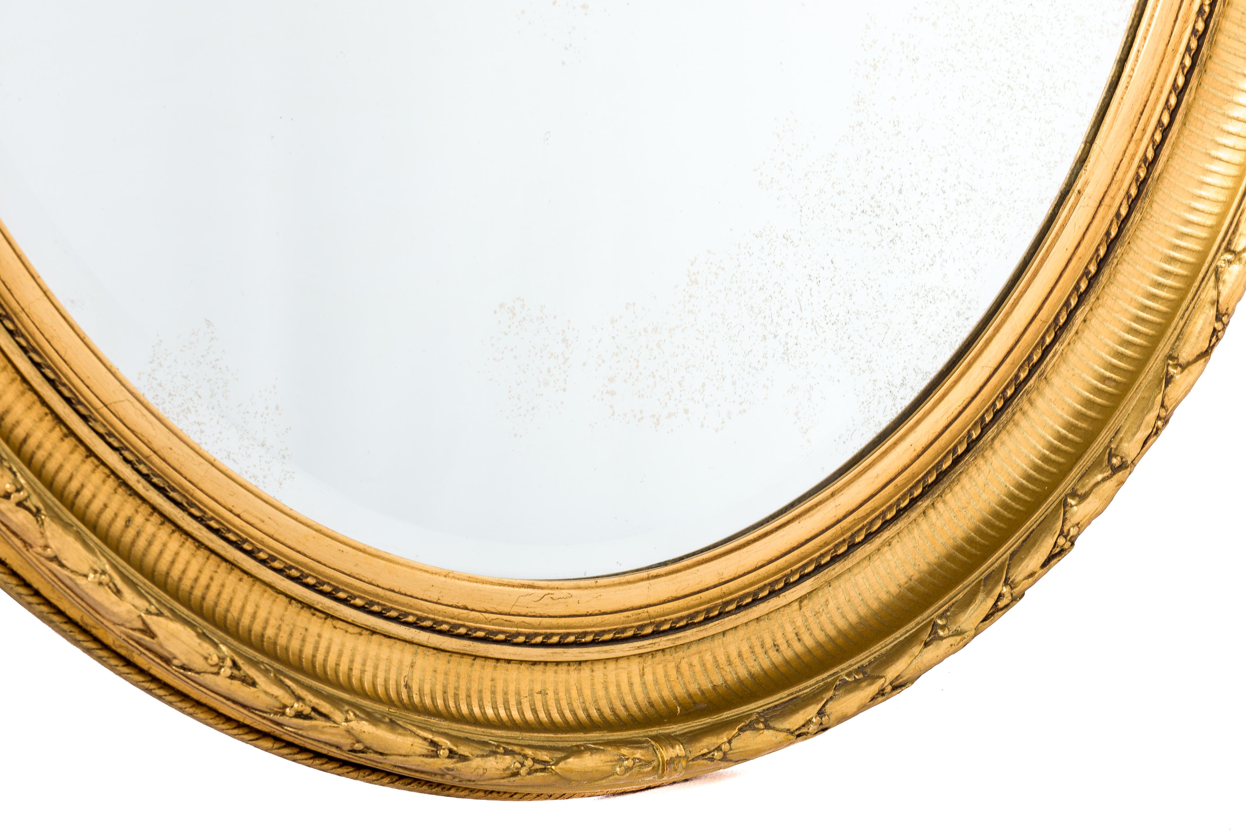 Antike 19. Jahrhundert Französisch Oval Blattgold vergoldet Louis Seize oder Empire Antiquitäten Spiegel (Louis XVI.) im Angebot