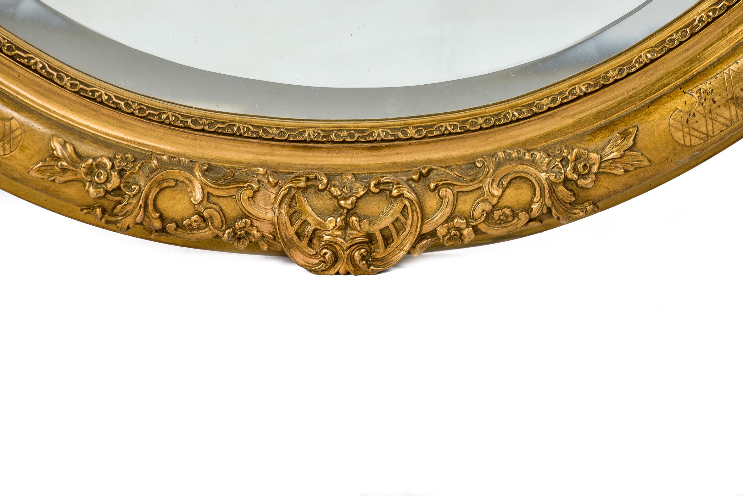 Gesso Antique 19th Century French Oval Gold Leaf Gilt Mirror with Faceted Glass