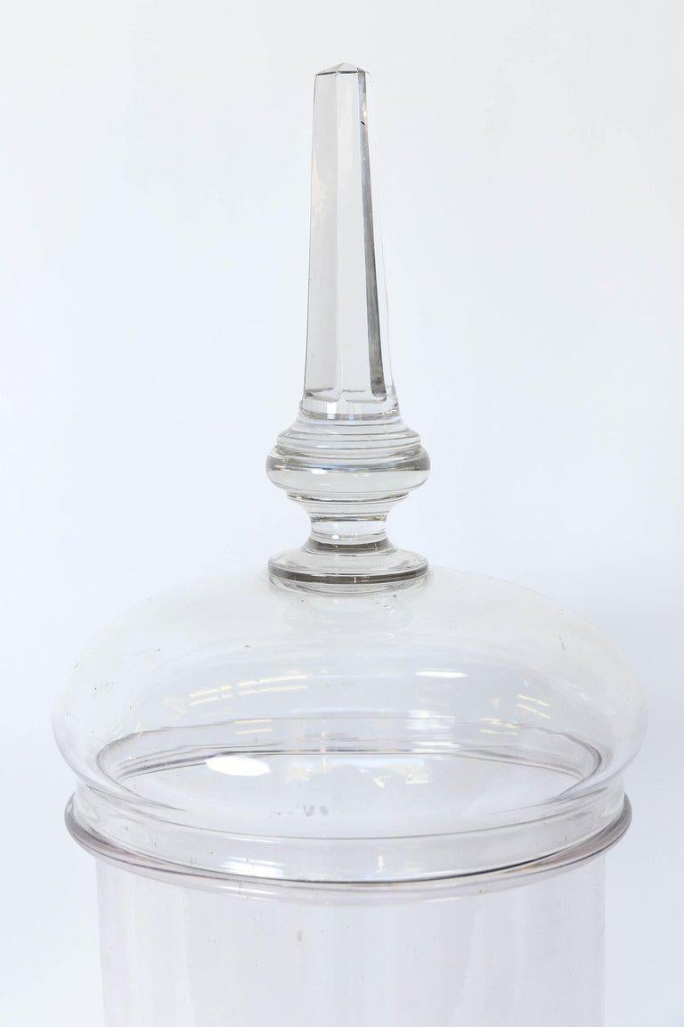 Beautiful glass French pharmacy jar. These jars were used in France either in pharmacy shops to display medicinal products or candy in confiserie shops. A lovely addition to your home.

H 31 in. x Dm 10.5 in.