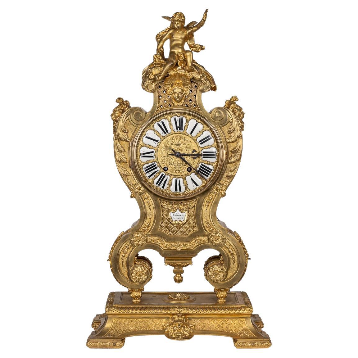Horloge ancienne de style Régence française du 19ème siècle en bronze doré, Thuret A Paris en vente