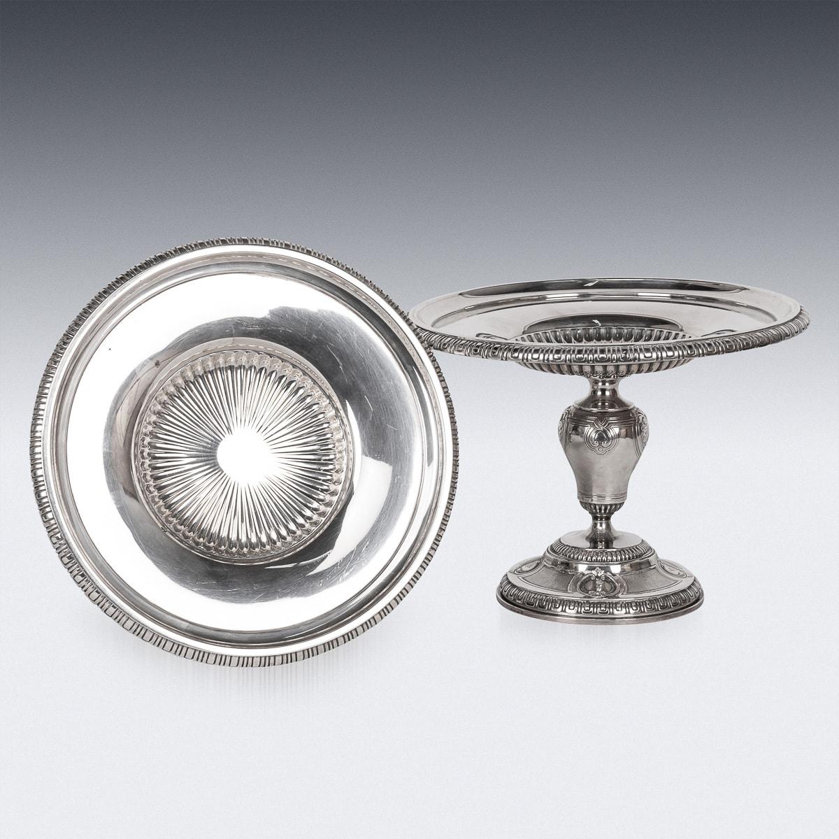 Antique late-19th Century French exquisite solid silver pair of comports. Standing on a domed foot adorned with scrolls, shells and fluted boarders, the inverted pear shaped foot supporting a dish. A truly superb and fine pair, made by undoubtedly