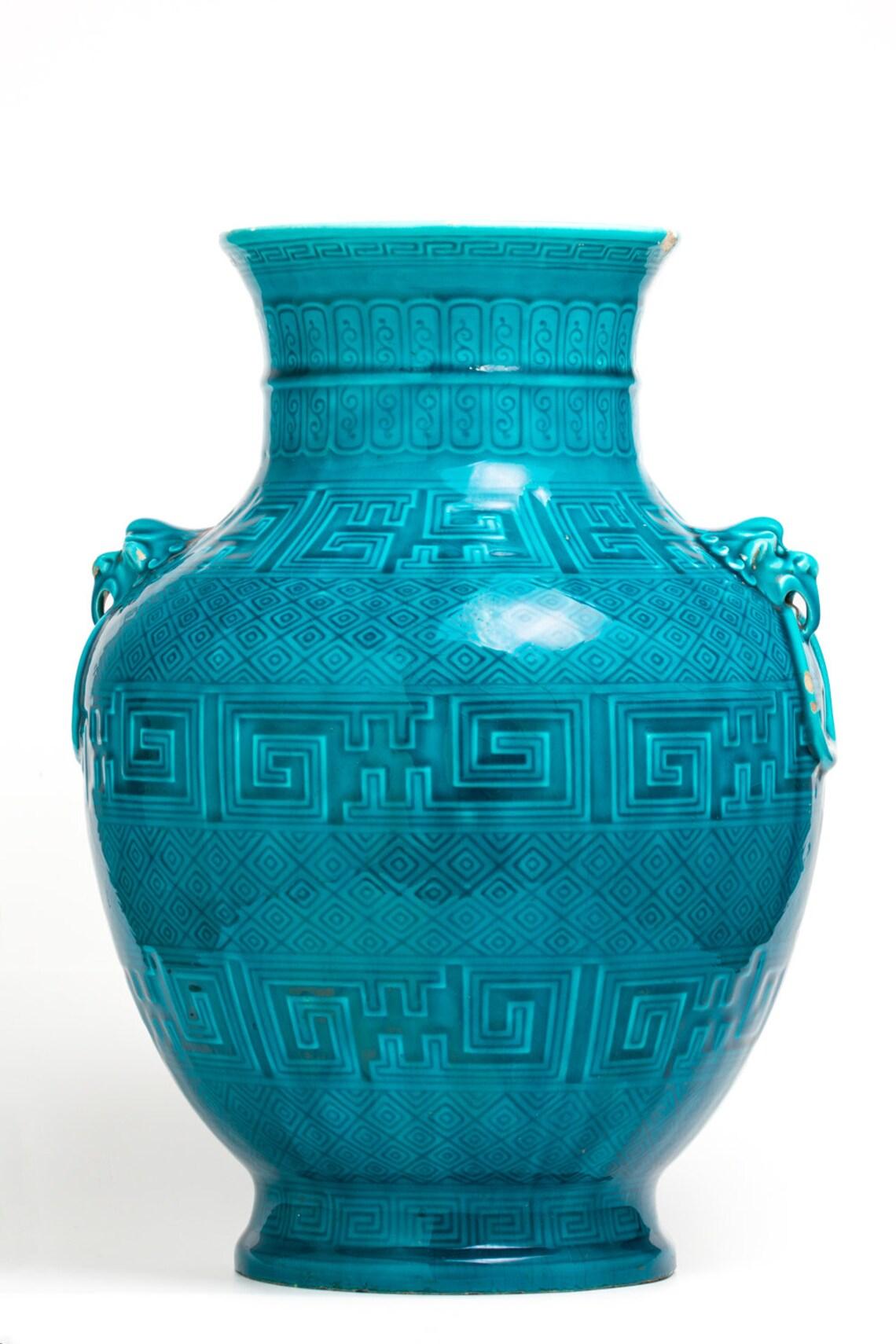 This large and spectacular late 19th century turquoise vase was made circa 1867 by Théodore Deck, the most admired ceramic artist in France in the late nineteenth century. Théodore Deck was well-known for the glazes that he developed, especially a