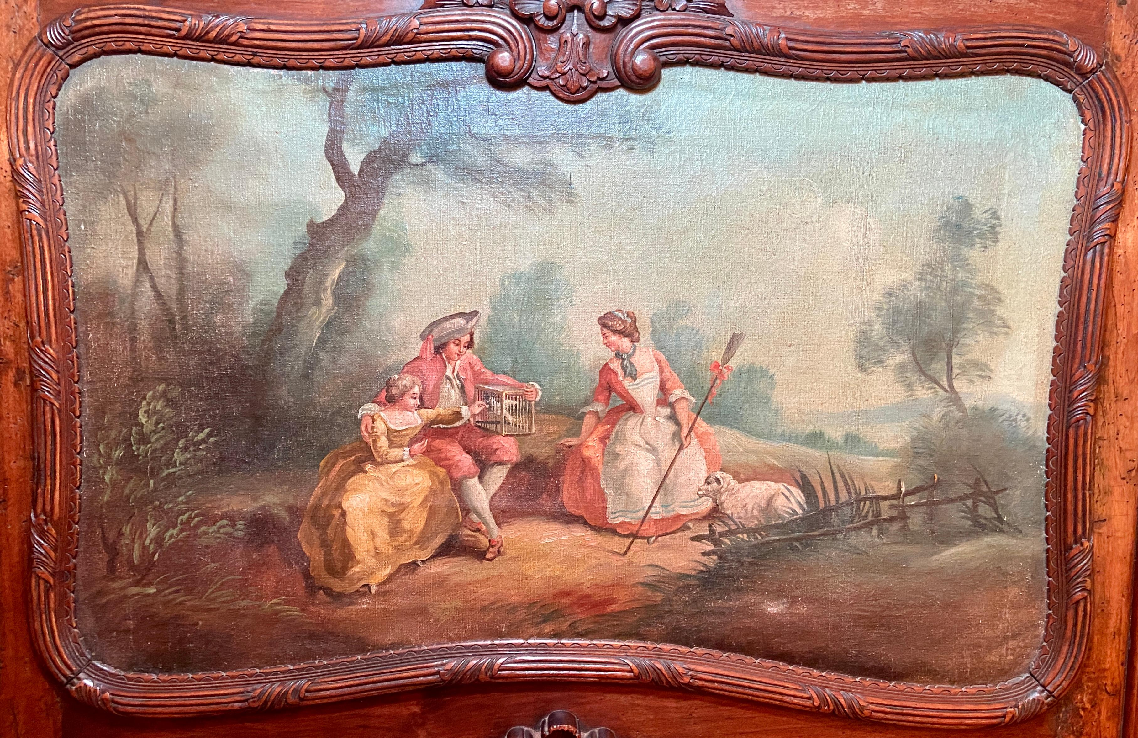 Antique 19th century French carved walnut Trumeau Morning with painted pastoral scene, Circa 1890.