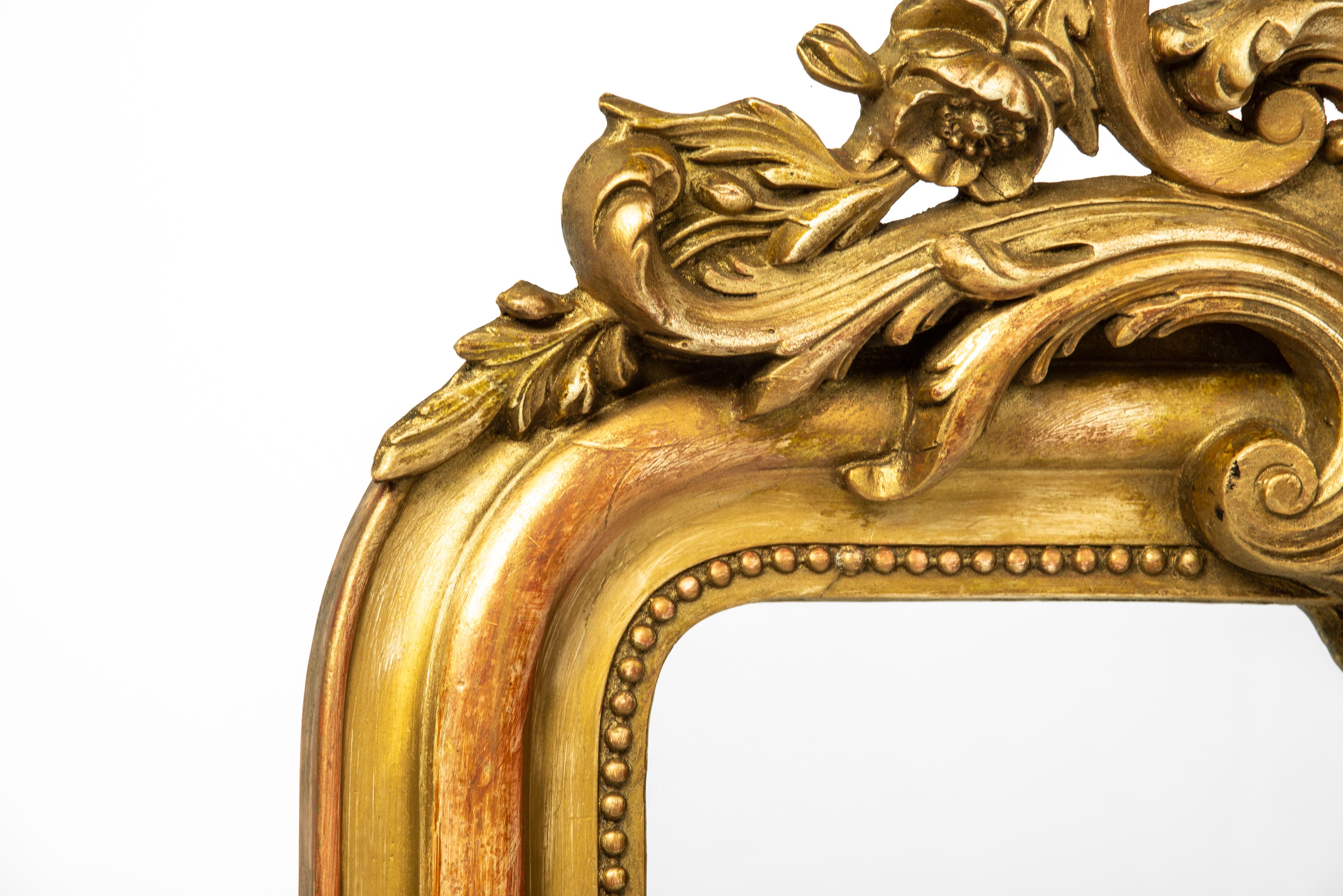 Gesso Antique 19th Century French Worn Gold Leaf Gilt Louis Philippe Mirror with Crest For Sale