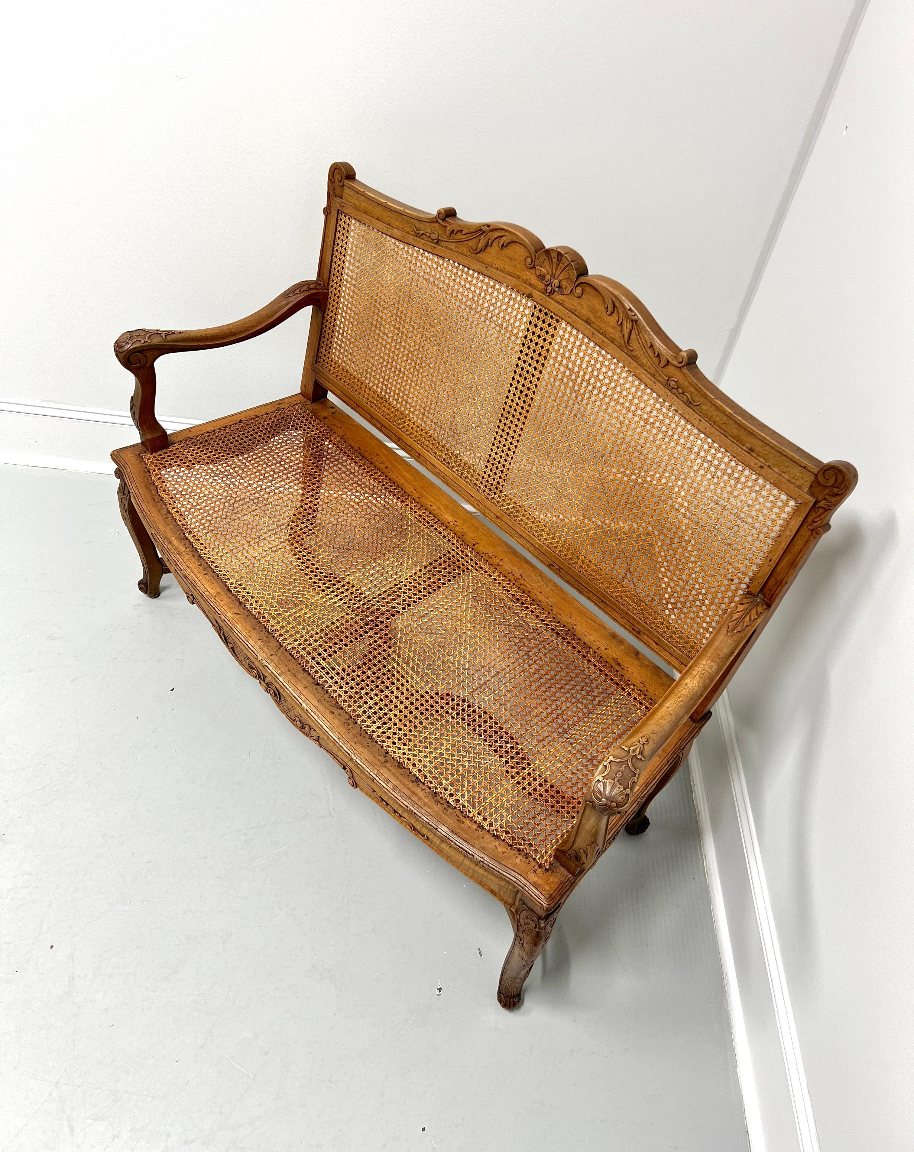 Antique 19th Century Fruitwood French Provincial Louis XV Caned Settee In Good Condition In Charlotte, NC