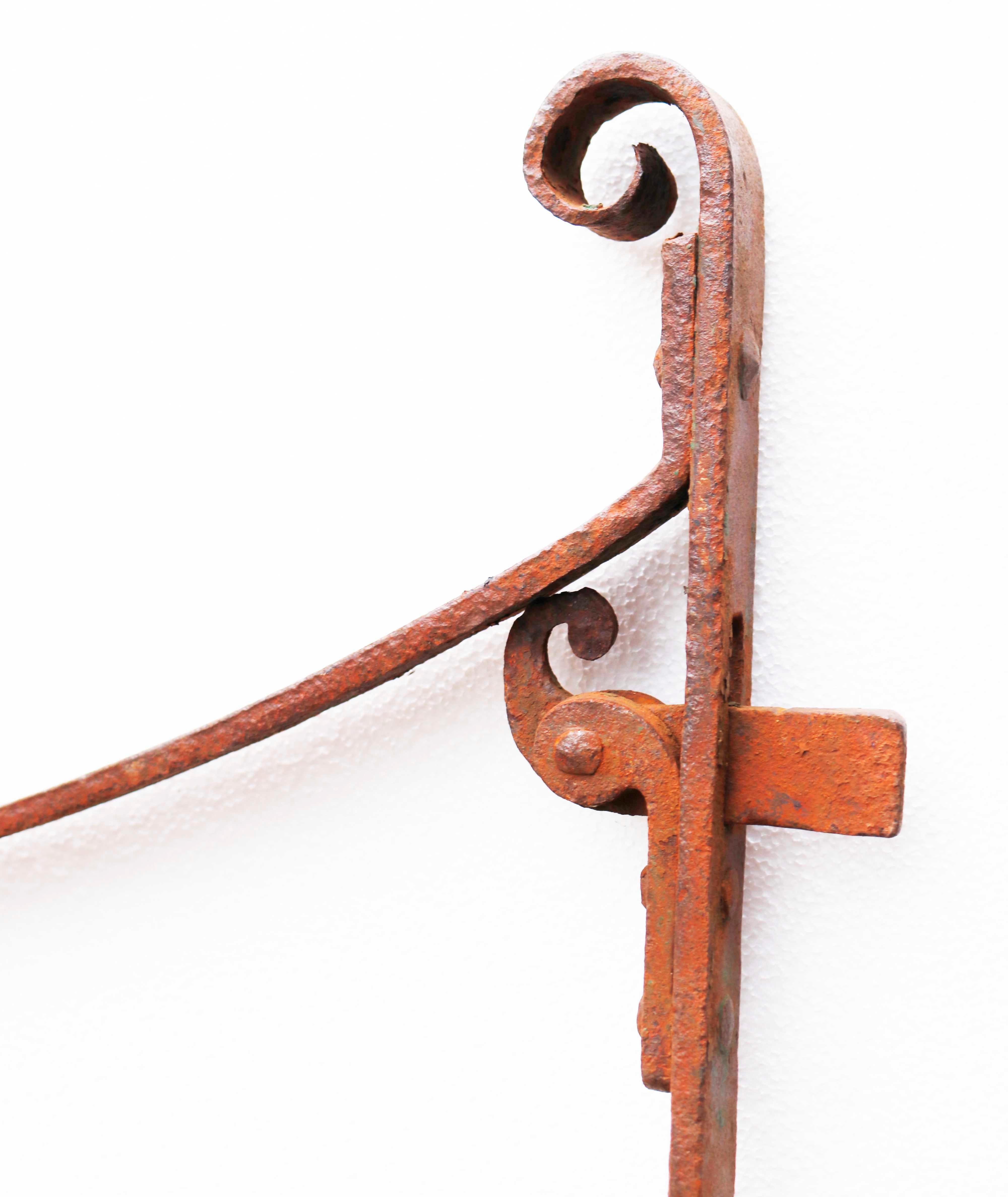 Early 19th Century Garden Gate. A Georgian style wrought iron garden gate, made of strapwork with a scrolled top.

What is Wrought Iron?

Wrought iron is a type of refined, low carbon iron that is smelted and worked on with tools. The term wrought