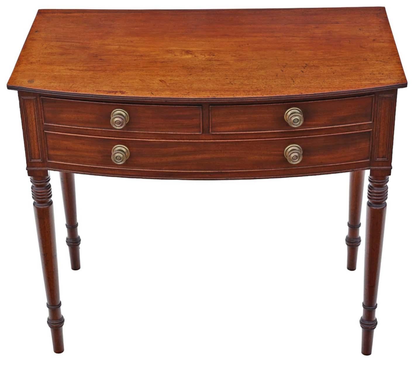 Introducing an Antique Fine Quality 19th Century Georgian Mahogany Writing Table, which also serves as a desk, dressing lamp, or large bedside table, showcasing a classical Georgian design.

Recently restored, the finishes of this exceptional piece