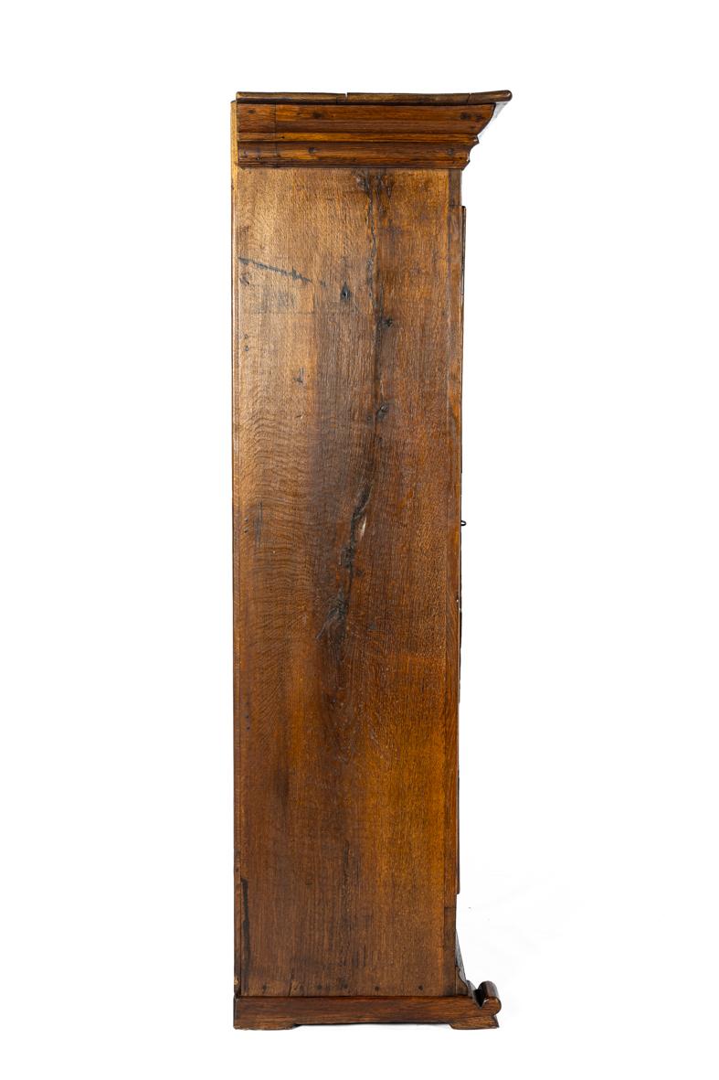 Antique 19th century german solid oak warm brown two-door cupboard or cabinet In Good Condition For Sale In Casteren, NL