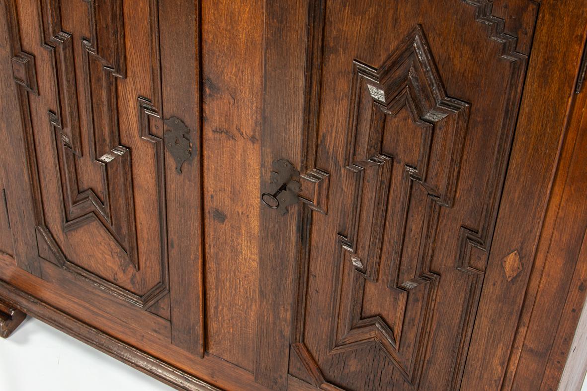Oak Antique 19th century german solid oak warm brown two-door cupboard or cabinet For Sale