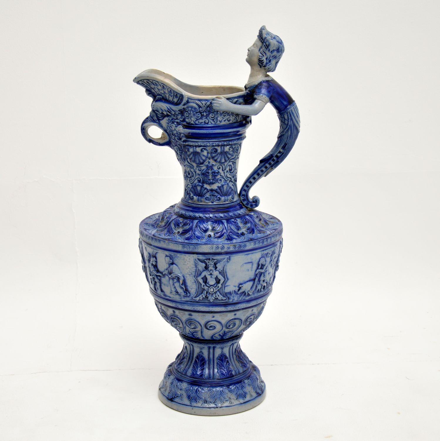 A beautiful and impressive antique Westerwald pottery ewer, made in Germany around the 1880-1900 period. Westerwald pottery was made in the Westerwaldkreis area in the Rheinland. It has a distinctive look, and is of extremely fine quality.

This