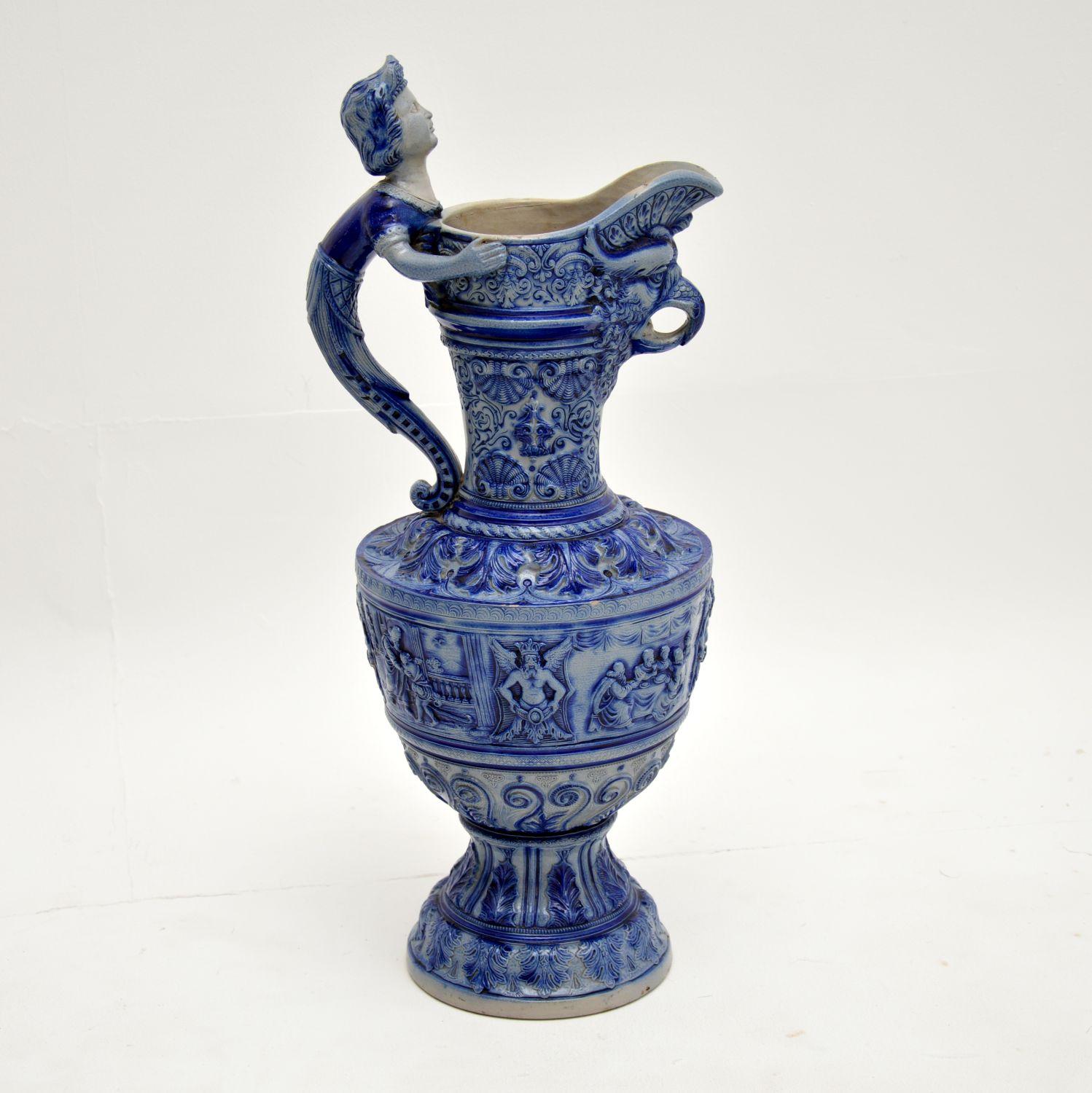 A beautiful and impressive antique Westerwald pottery ewer, made in Germany around the 1880-1900 period. Westerwald pottery was made in the Westerwaldkreis area in the Rheinland. It has a distinctive look, and is of extremely fine quality.

This