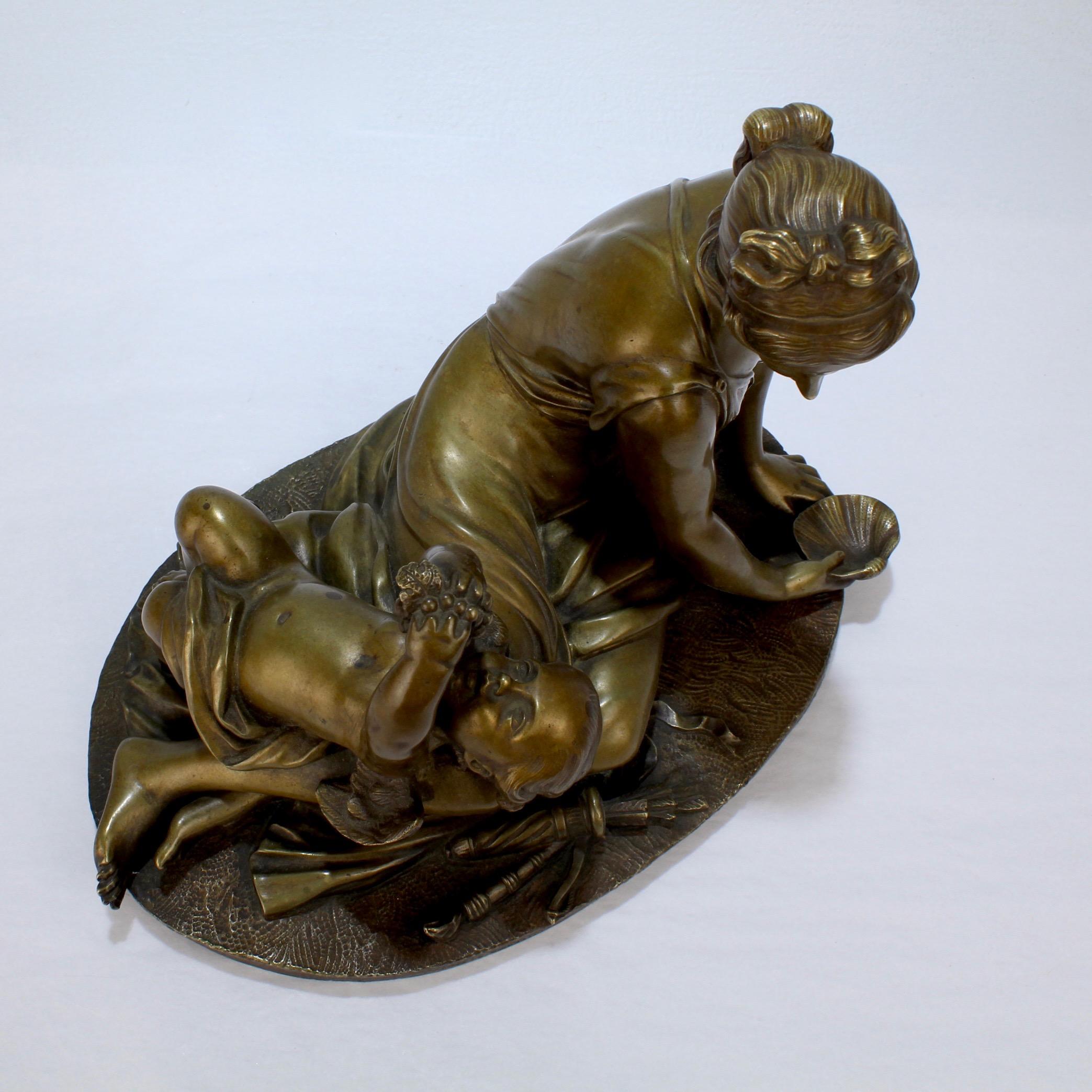Bronze doré français ancien du 19ème siècle représentant Vénus et Cupidon d'après Carrier-Belleuse en vente 1