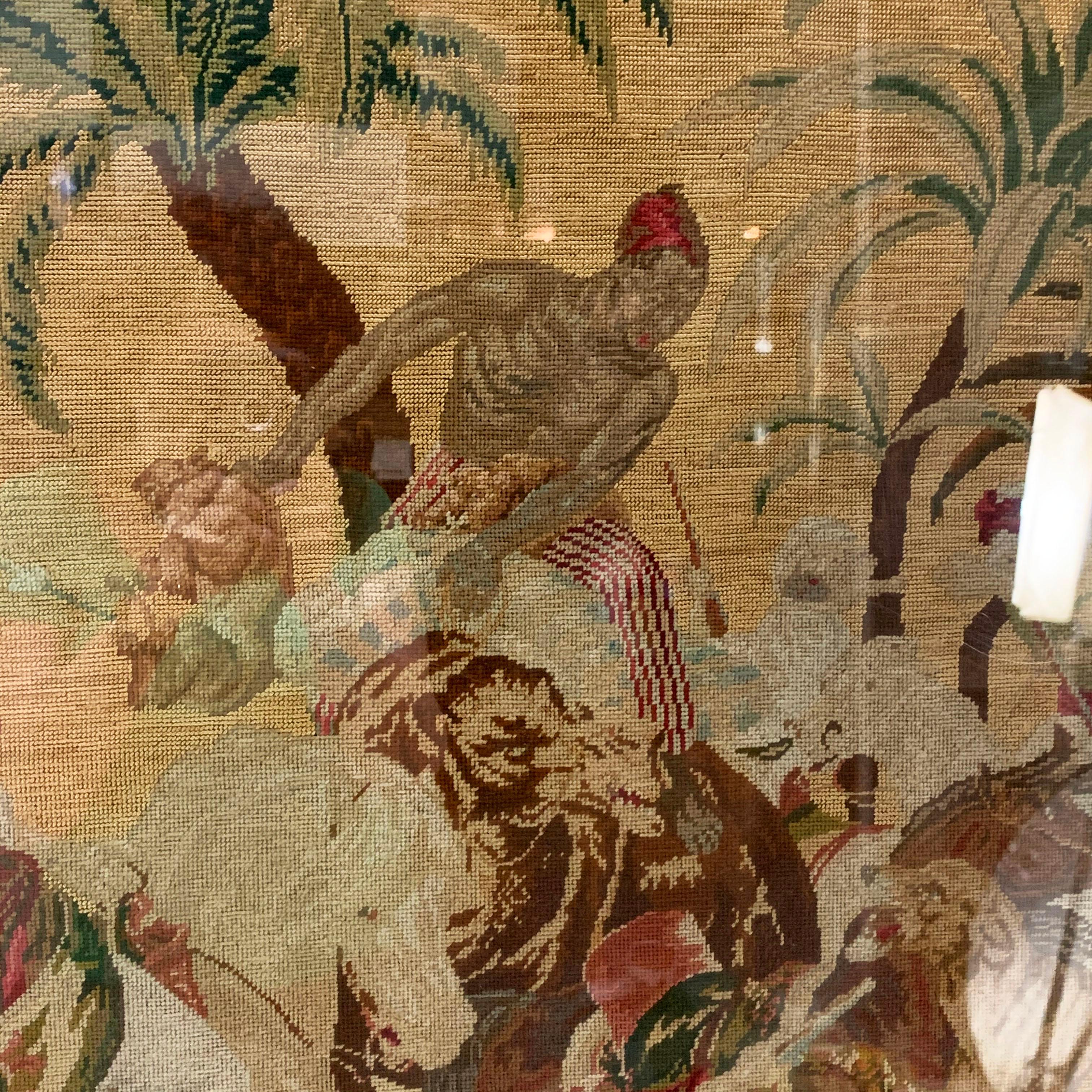 Framed (behind glass) 19th century Gobelin style Belgian woolwork tapestry depicting French artist Horace Vernet’s “Lion Hunt in the Sahara Desert, 28 May, 1833” .