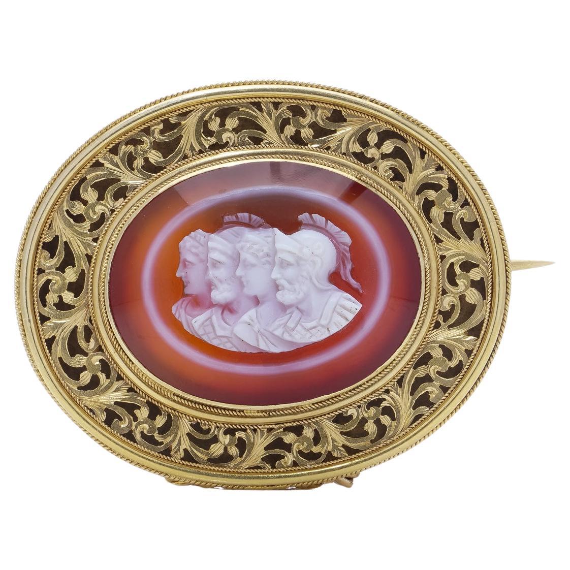 Antique 19th century gold and carved banded agate cameo brooch For Sale