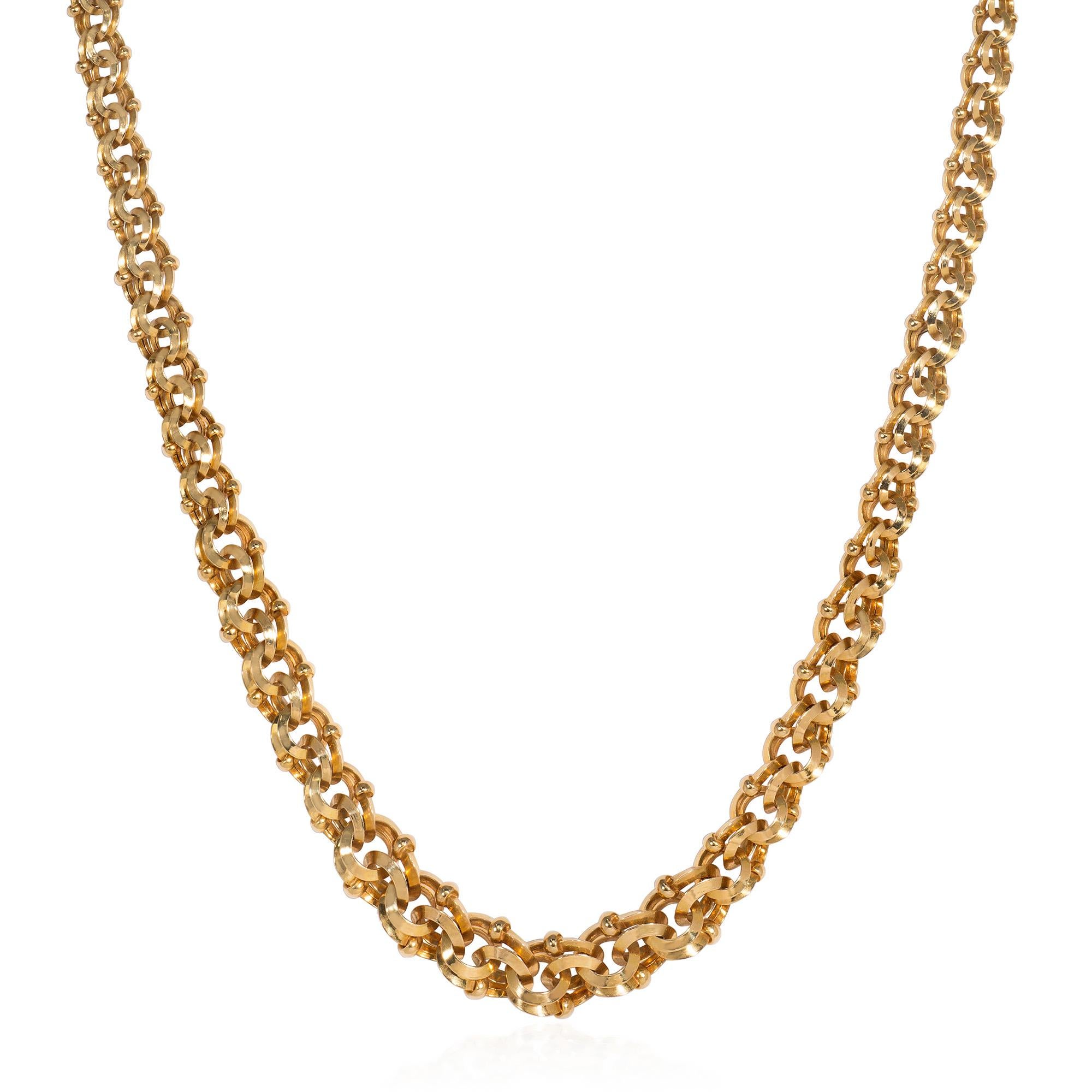An antique Victorian period gold chain necklace of graduated interlocking loop design with bead accents, in 18k, completed by a tongue and box clasp with figure-8 safety.  French import.
A beautiful variation on the classic chain link