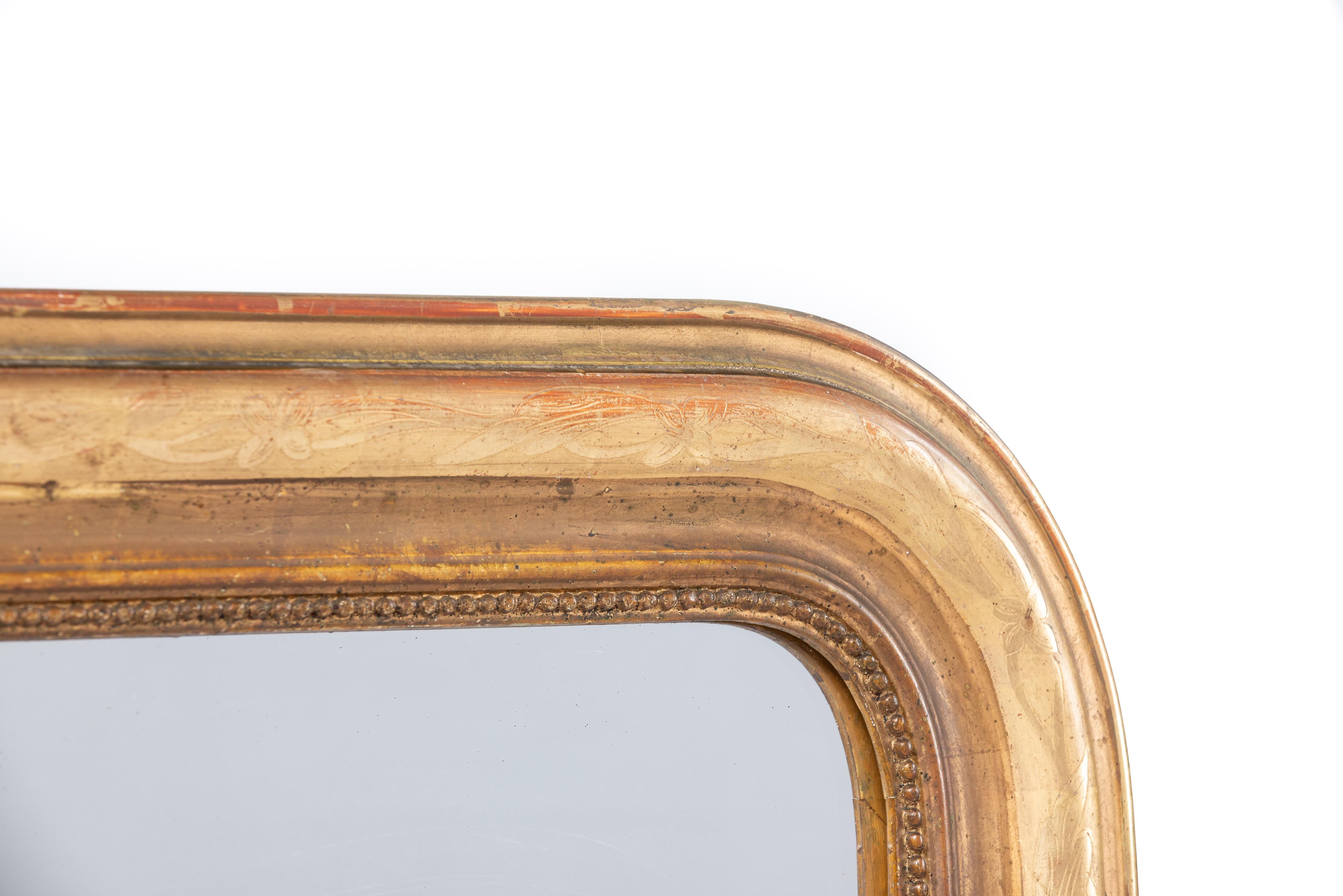 Polished Antique 19th-century gold leaf gilt and engraved French Louis Philippe Mirror For Sale