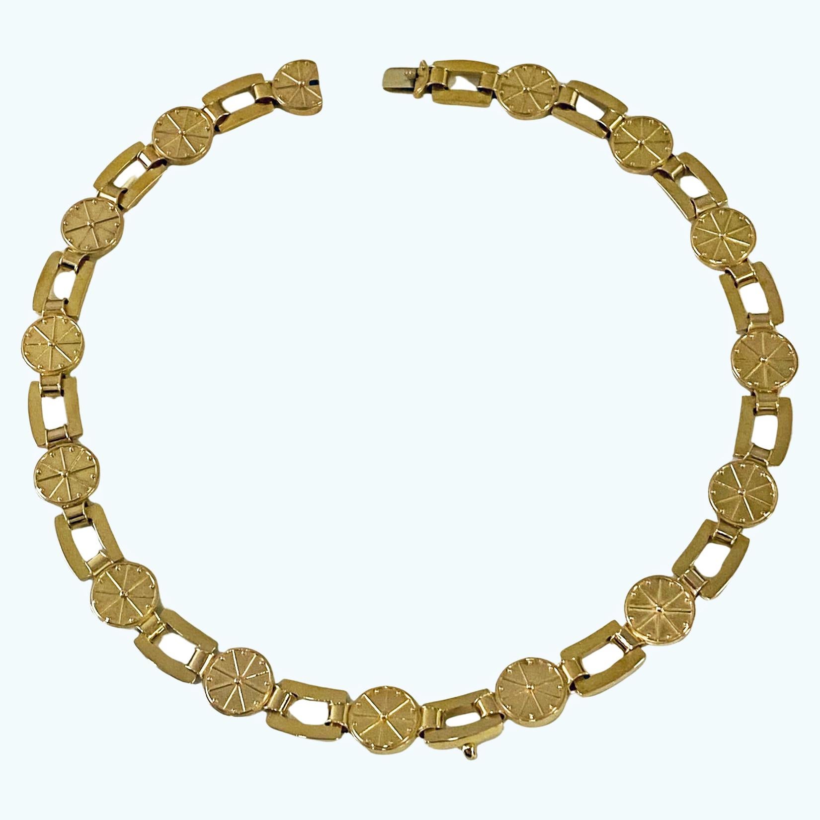Antique Gold Necklace English Circa 1860. Composed of rectangular and circular-shaped links, partly decorated with ray design. Tongue clasp fastener conforming to link. Bale hook fitment to allow for a drop pendant. Length: 17.50 inches. Item